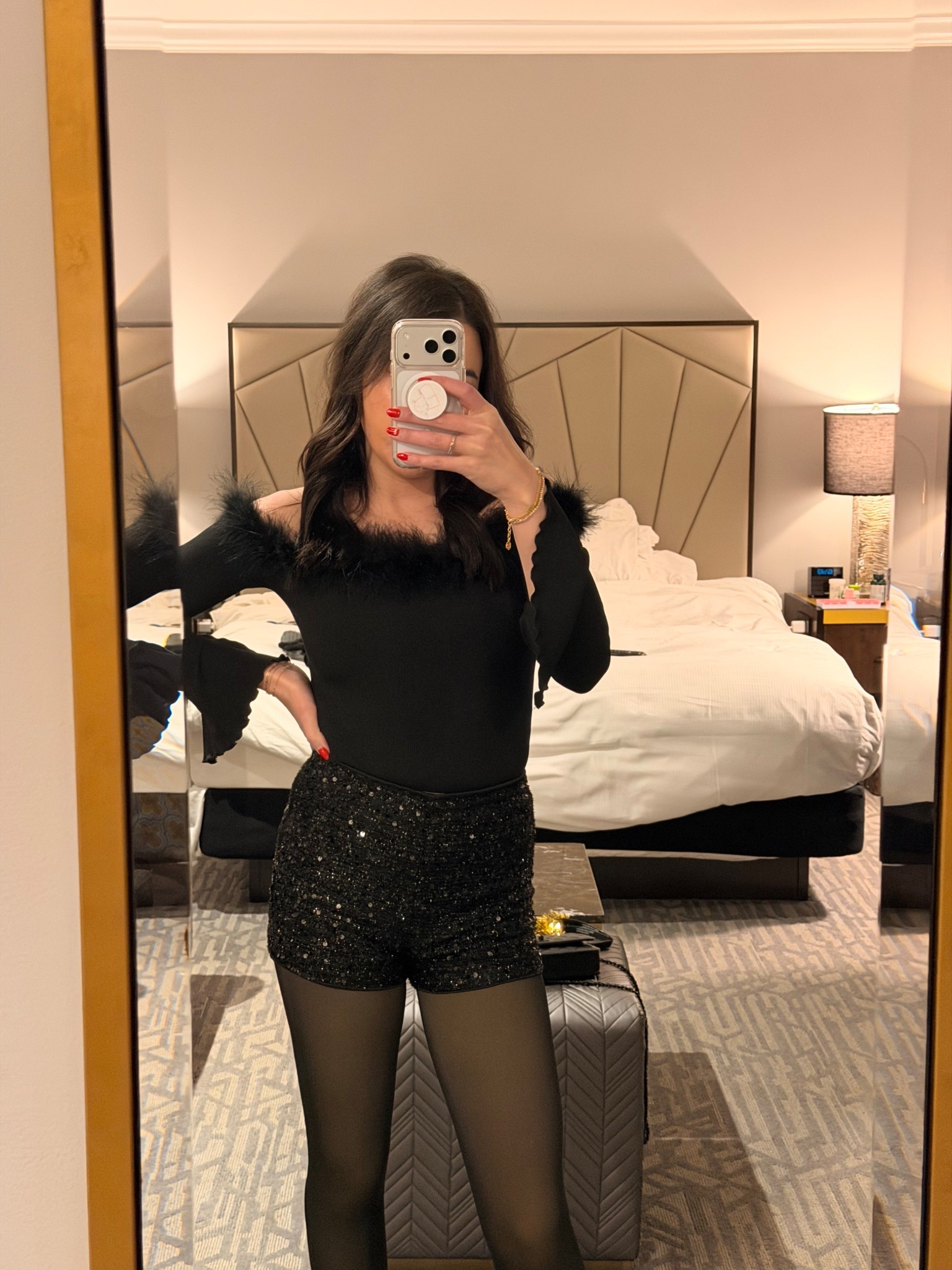 NYE ✨ sparkly mini shorts, black long sleeve feather top, fleece lined leggings 

#LTKgrwm #LTKFindsUnder50 #LTKSeasonal