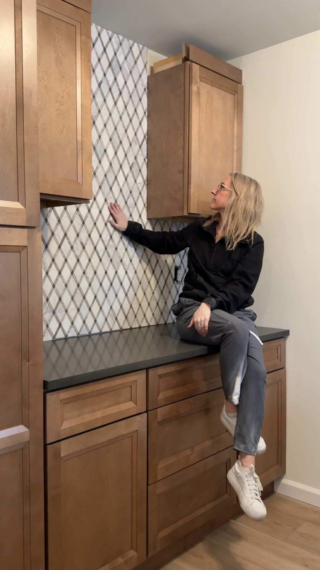 Tile and countertops are in and looking 🔥😍

I stepped outside my design comfort zone with this one and I LOVE it so far! I usually would pick bright and airy everything but I felt like the laundry room was a great place to take a risk!

Do you like the dark counters?! A lot of you voted for the lighter counters… does this change your mind? What do you think?!

Next up: grouting the tile, adding the crown molding and the floating shelves!

#LTKHome