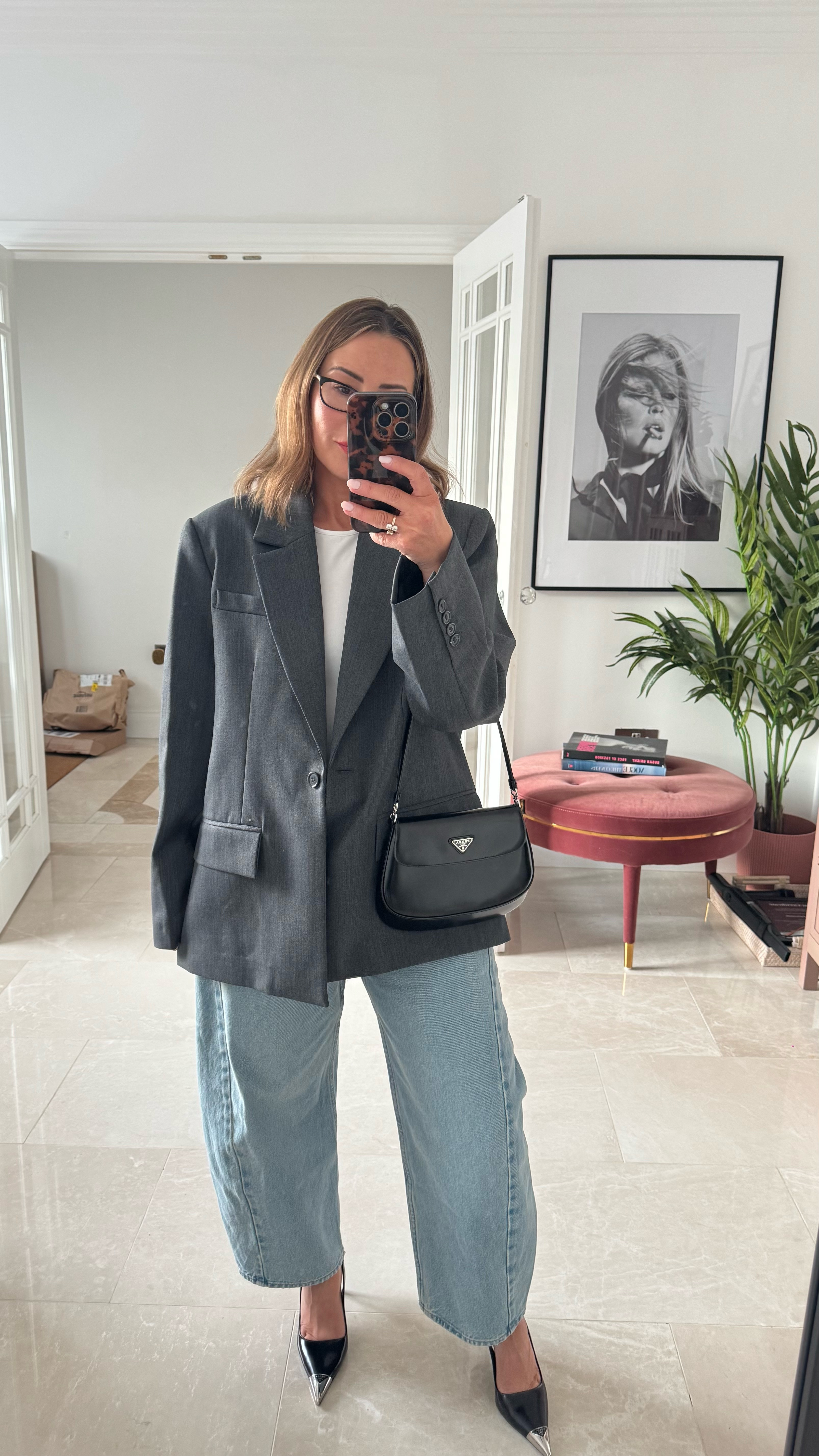 Anthropologie blazer 
Abercrombie jeans 
Prada bag and shoes 

Grey blazer / spring style / April style / new outfit / spring 2025 / barrel jeans / Abercrombie jeans / Anthropologie blazer / prada heels / petite style / petite outfits 

#LTKpetite #LTKspring #LTKuk