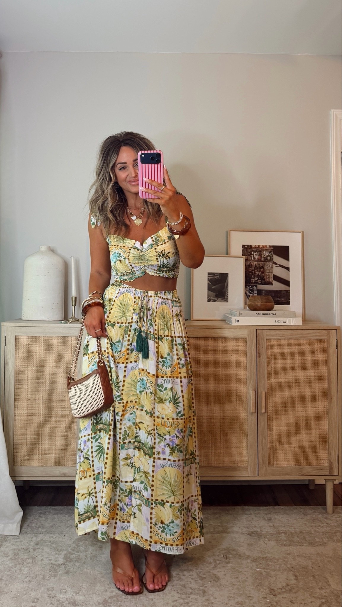 35% off with LEANN35 💛 the cutest summer set! perfect for vacation! would be so cute for brunch on the patio on a hot sunny day! i love the smocked detail + adjustable ties. size S top, size M skirt. summer outfit @VICI

#LTKootd