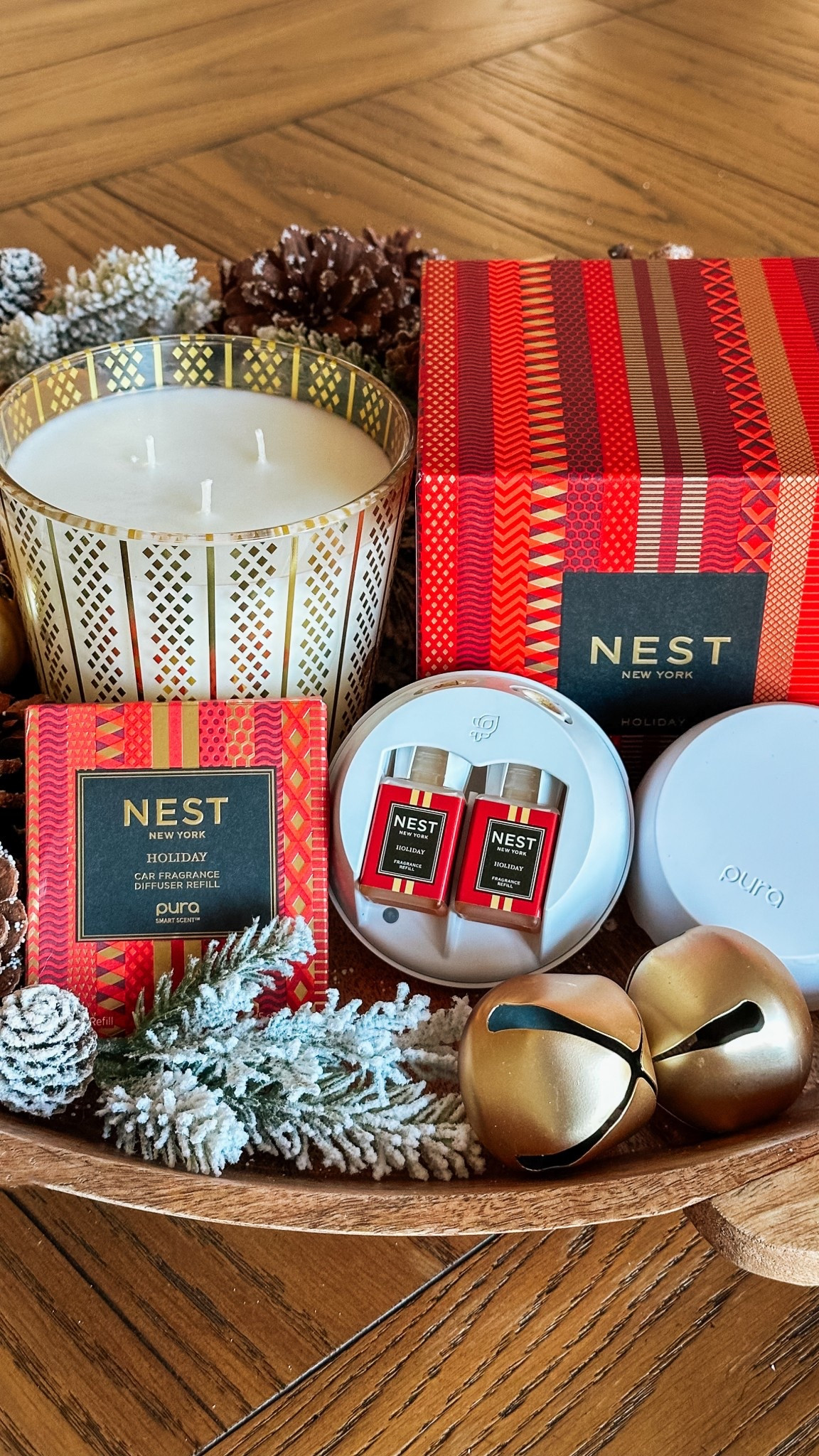 NEST New York Holiday is hands-down my fragrance of the season. Saying I'm obsessed is an understatement.🎄❤️
It's in my Pura diffuser (on repeat!), and I just ordered the 3-wick candle so cue all the magical holiday vibes. If I don't have it all together, at least my house smells like Christmas magic.
Shop my must-have scent of the season! 

#LTKHome #LTKGiftGuide #LTKHoliday