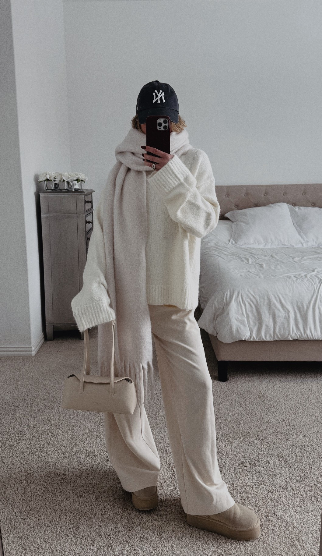 Neutral winter outfit featuring a cozy knit sweater, wide leg elevated sweatpants, soft oversized scarf, and functional mini bag.
Effortless cold weather look perfect for everyday wear, travel days, and casual winter styling.

Chic neutral layers, elevated basics, and timeless winter pieces for an easy capsule wardrobe 🤍

#LTKootd #LTKSeasonal #LTKmomlife