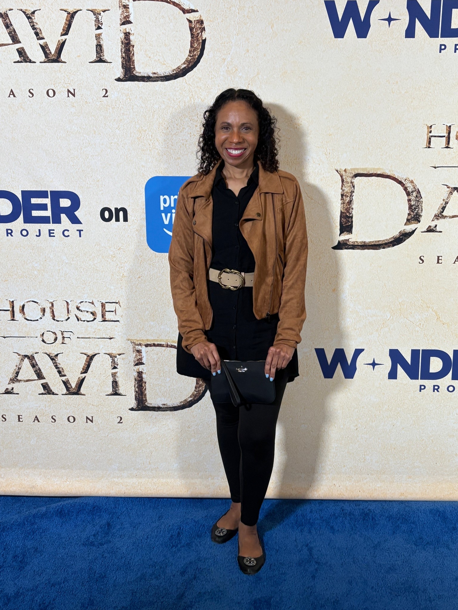 ✨ Blue carpet moment at the House of David Season 2 premiere! ✨
The dress code was business casual, so I started with a black shirt dress — something work-ready — and styled it to go from day to night. Layered it over leggings, cinched with a suede twist-rope buckle belt, and topped it with a moto jacket for a polished edge. Comfortable Tory Burch flats, gold pavé huggies, and a Kate Spade wristlet pulled it all together.

🖤 A versatile look that worked perfectly for an eventful night of film, faith, and style! Would you style this base look more for work or for evening?

#LTKEventStyle #DayToNightStyle #RedCarpetLook

#LTKWorkwear #LTKParties #LTKStyleTip