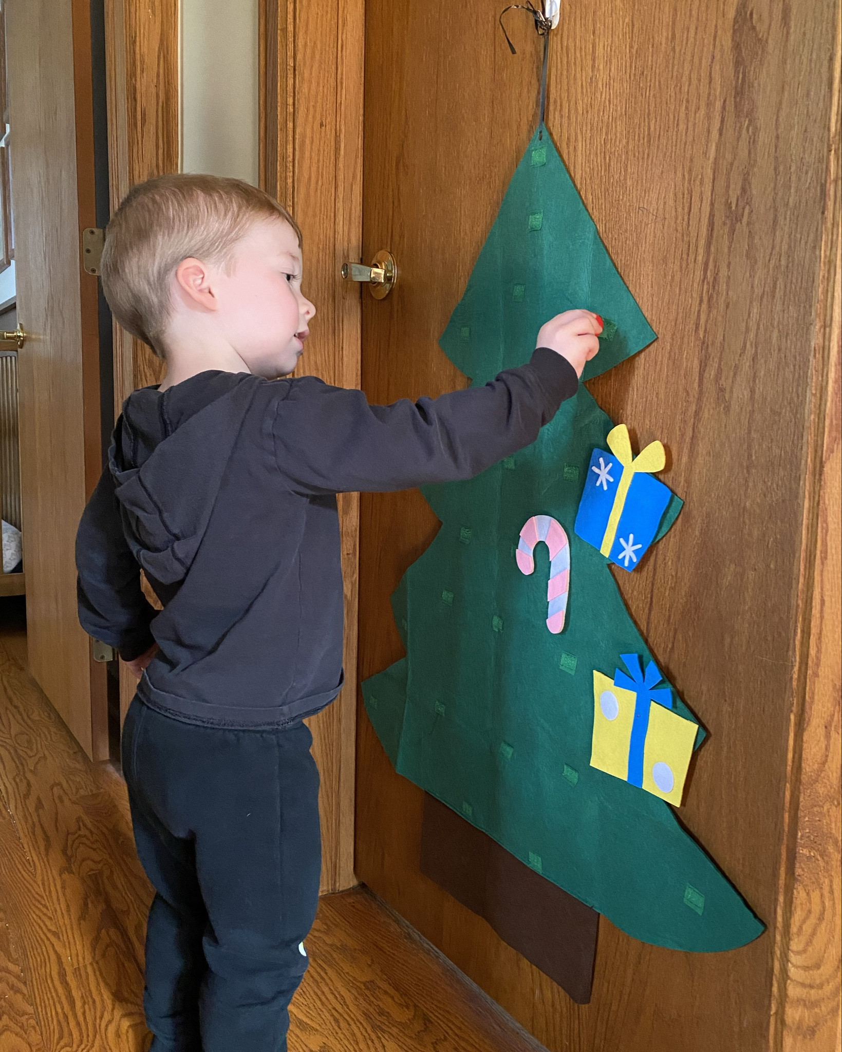 It’s that time of year to start decorating! 
I ordered this last holiday season for my son’s bedroom door and he is loving it even more this Christmas. 
It’s been a great addition for independent play, quiet time and creativity. 

#christmastree #christmas #toddleractivities

#LTKSeasonal #LTKKids #LTKHoliday