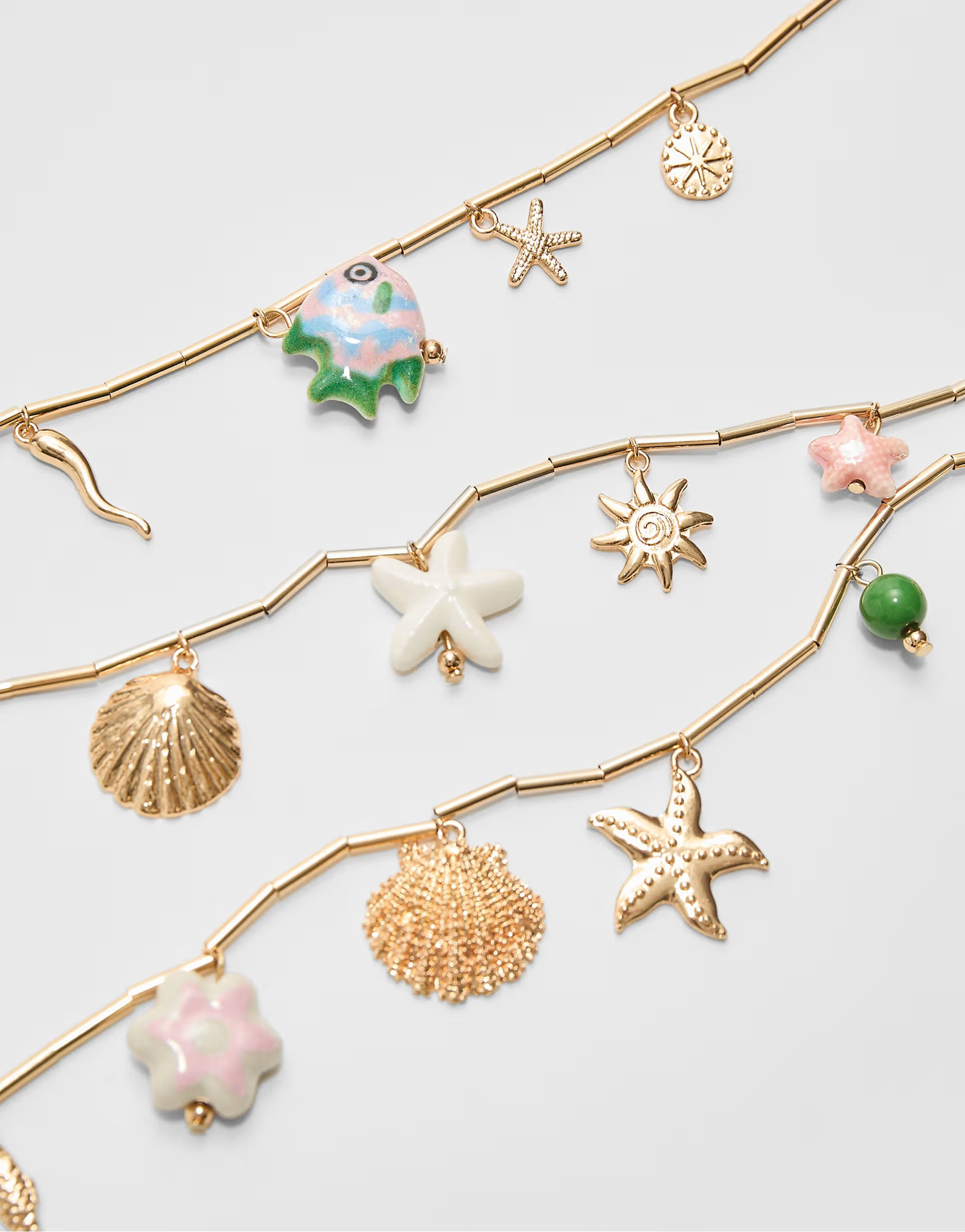 Stradivarius under the sea charm necklace in gold | ASOS | ASOS (Global)