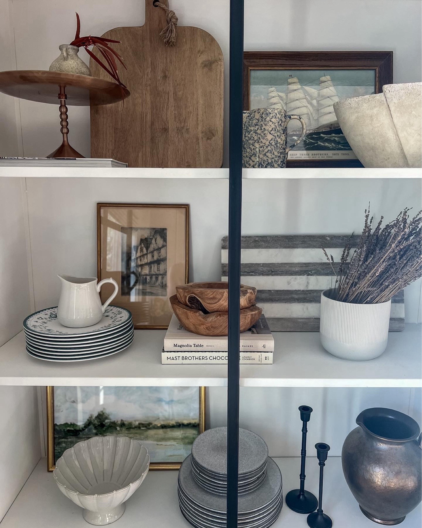 I can’t wait to style these shelves with some spring and summer finds soon, but until then I’m loving all of these pieces. My favorite might just be this stunning antique vase from Etsy (top shelf)! A rare find, and the perfect pop of color for this charming piece. 

#LTKhome #LTKstyletip