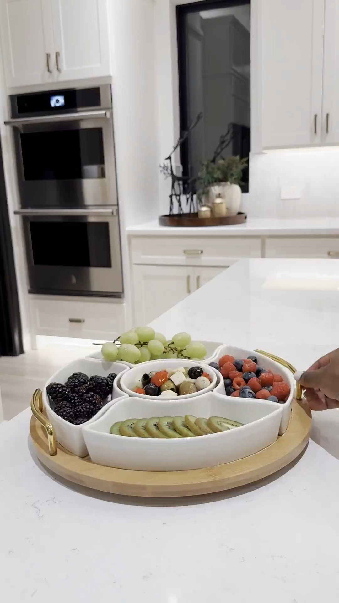Gold cluster tray is now sold out…. I’ve linked the white and gold option 🤎

Found the most practical serving containers that can be used all year round! 🥘 …. The cluster tray comes in white/gold, silver, & gold - perfect for serving appetizers & is handwash recommended ☺️

Condiment server - perfect for serving your guacamole, cheese dips, ketchup, mustard, and relish! 🍲 

Lazy Susan serving tray - has got to be my fave find! 🍱 The upgraded fruit platter, Taco bar, chip and dip station 🤎

#LTKHoliday #LTKHome #LTKSeasonal