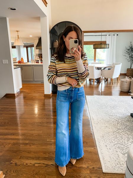 Sharing more details on these jeans. I’m 5’3” and have in a 3” heel here. I’m stories today I’m also sharing with a flat. 
Linking a few more similar jeans at a variety of prices. 
Jeans - I went down one size to 24
Size small sweater 

#LTKstyletip #LTKSeasonal #LTKover40