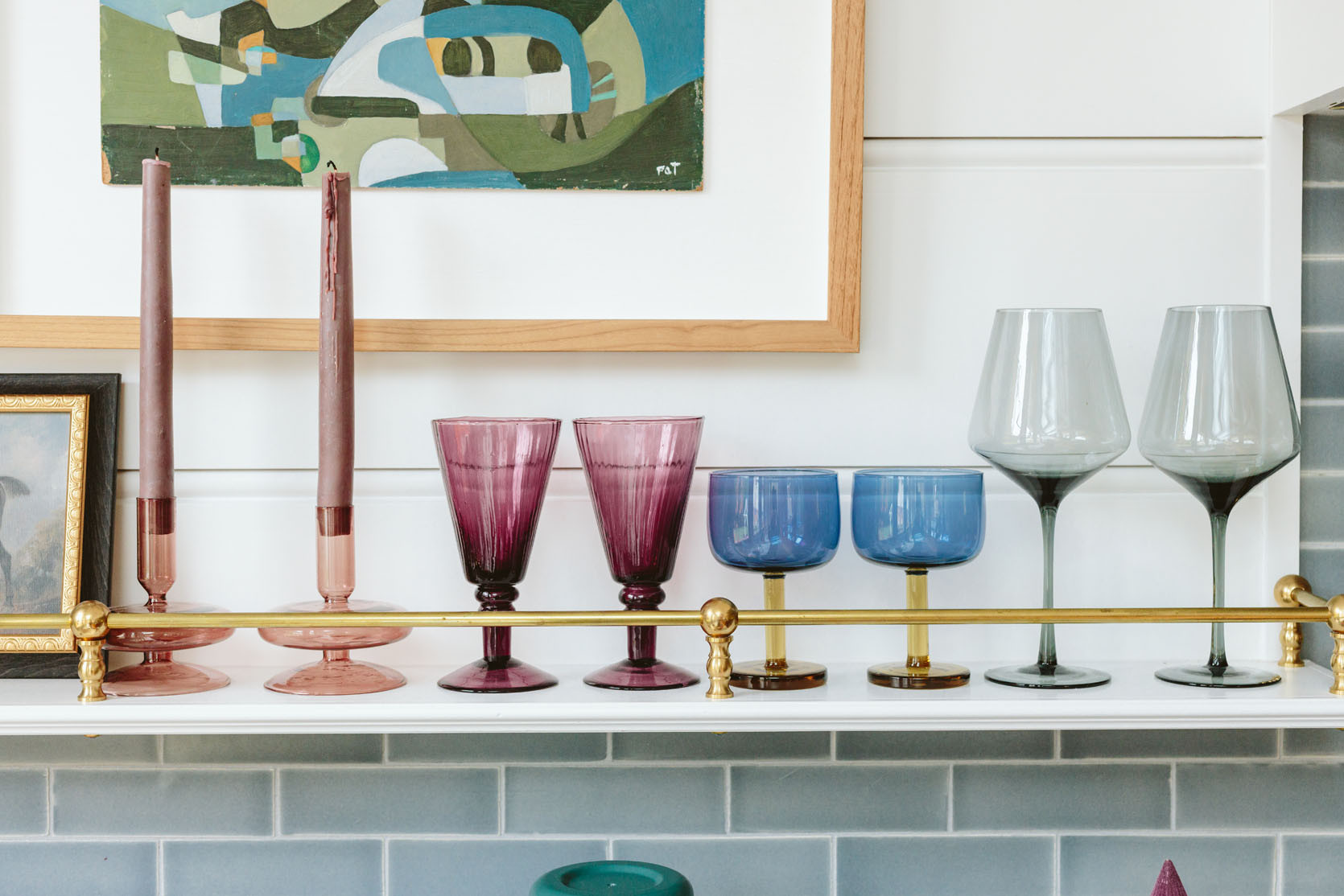 The glassware that I collected on the shelves are just better than basic – the two-toned glasses are thick and special (and splurgier) while the purple goblets are affordable and so rich. And don’t forget the $8 glass candle holders – so good, so pretty, so affordable. I have them on my coffee table.

#LTKHome #LTKHoliday #LTKGiftGuide