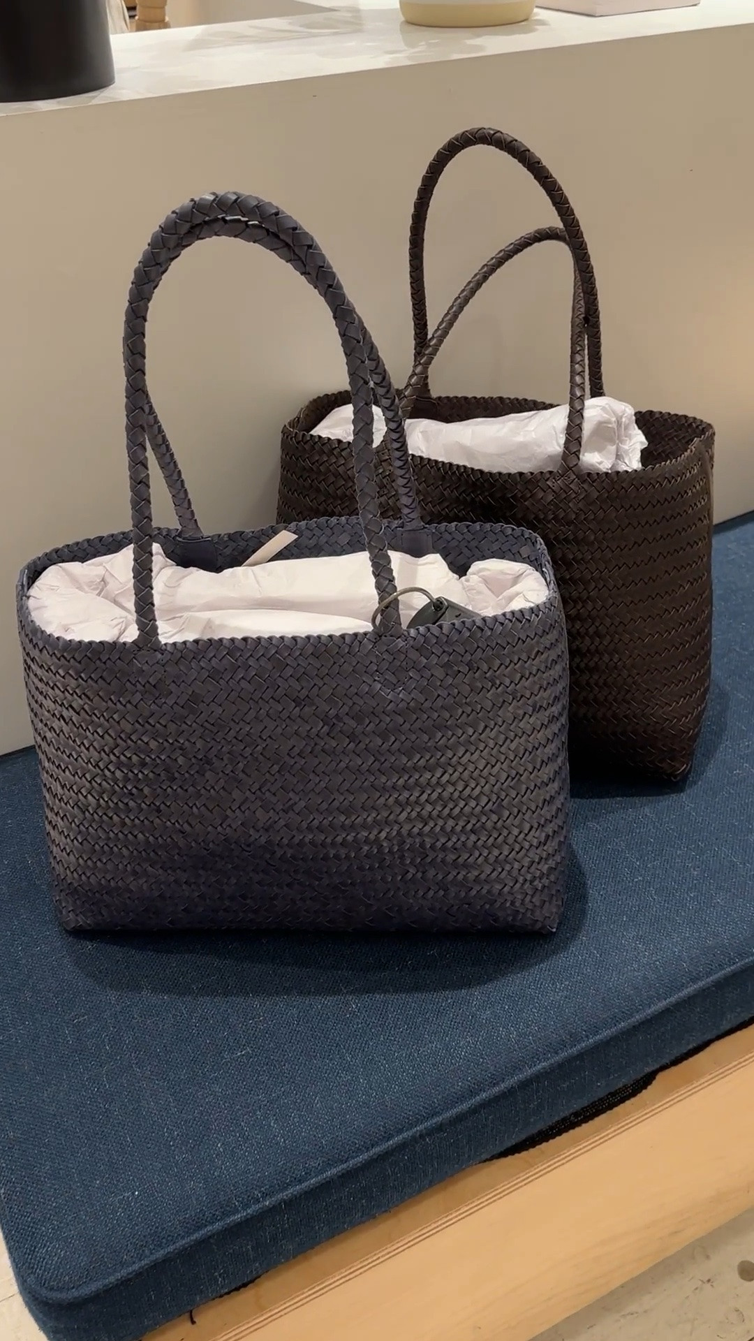 Finally back in navy! My most used leather tote! Love how lightweight and pliable it is.

Easily fits my laptop. Great for travel, school, mom bag and I also used it as my pool bag since the woven texture can work for vacation looks. 

The base is not structured fyi so will slouch when filled but it doesn’t bother me because the overall tote is softly structured. Small inner pocket. 

This is the dark navy blue vs the brown!

#LTKTravel #LTKmomlife #LTKxMadewell