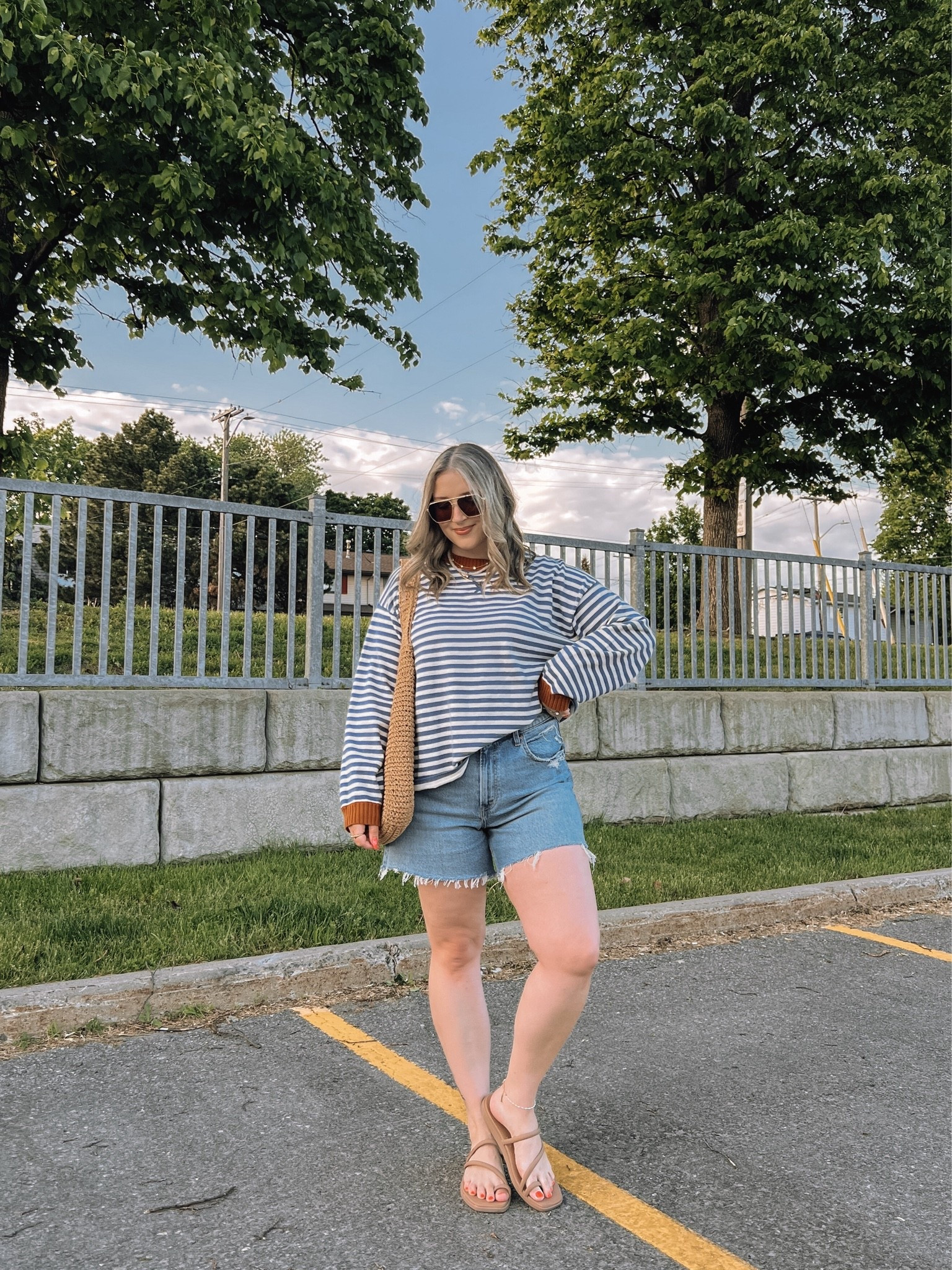 Comfy early summer outfit! Sized up to 32 in the denim shorts for a looser fit. Sweater is sold out from aerie, but linked the newer version of it (same stripe & fabric, just without cuffs). Crocs sandals are super comfy, I’m a 9.5-10 and wear a 10. Canadian Crocs link under “similar products”

#LTKsummer #LTKmidsize #LTKstyletip