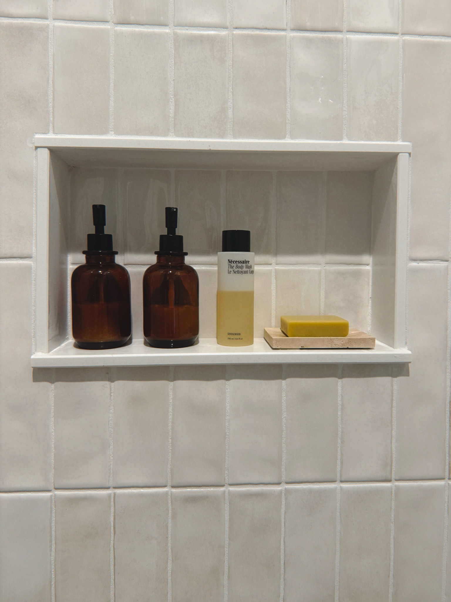 Minimal & Aesthetic Shower • I used my label maker + transparent tape to label the bottom of amber glasses for shampoo & conditioner 

#LTKfindsunder50 #LTKhome #LTKMostLoved