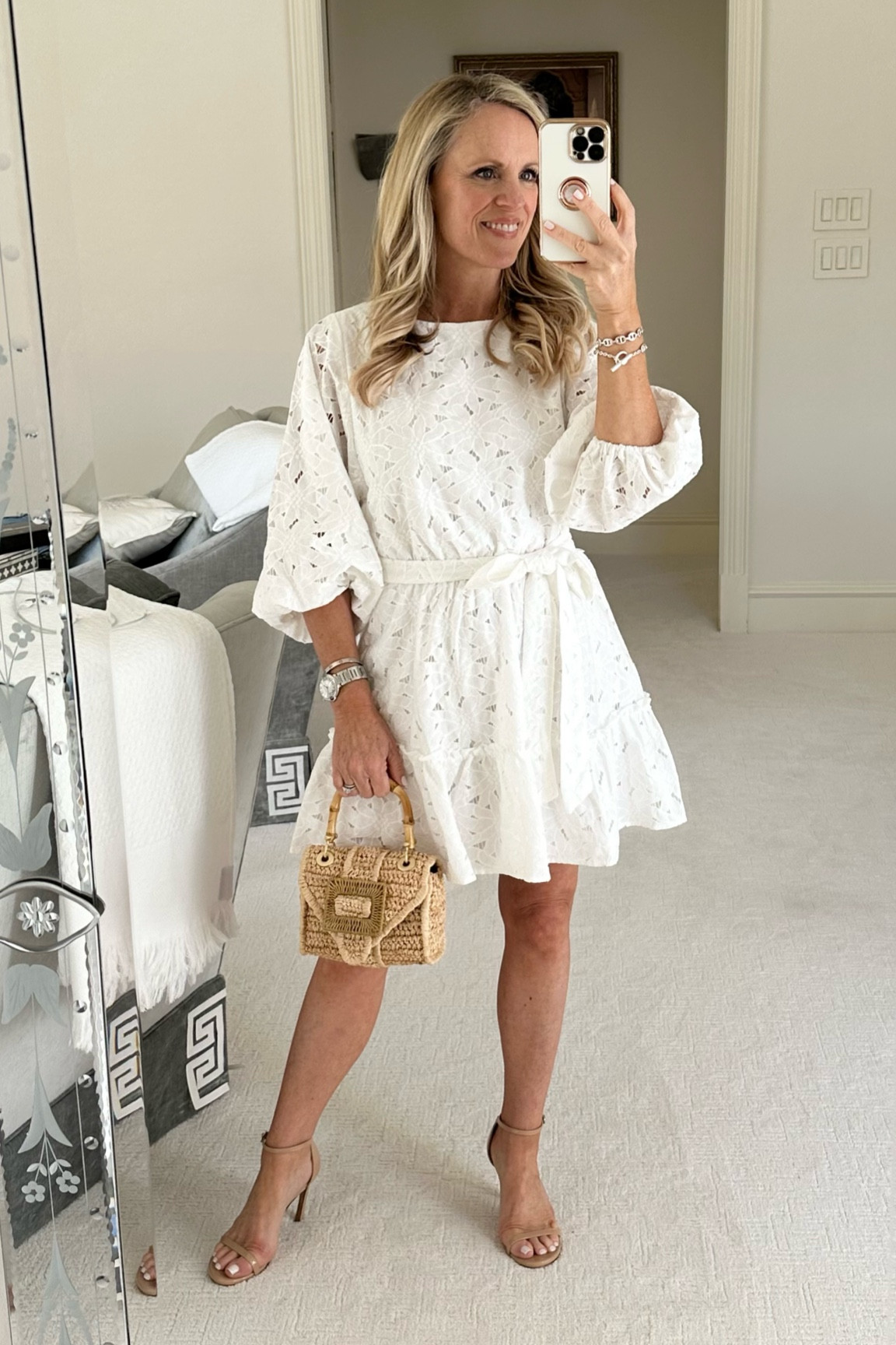 Pretty white dress for spring and Easter 
Long sleeve lace dress
White lace mini dress 
Raffia bag
Nude sandals 

#LTKSeasonal #LTKFind #LTKunder100