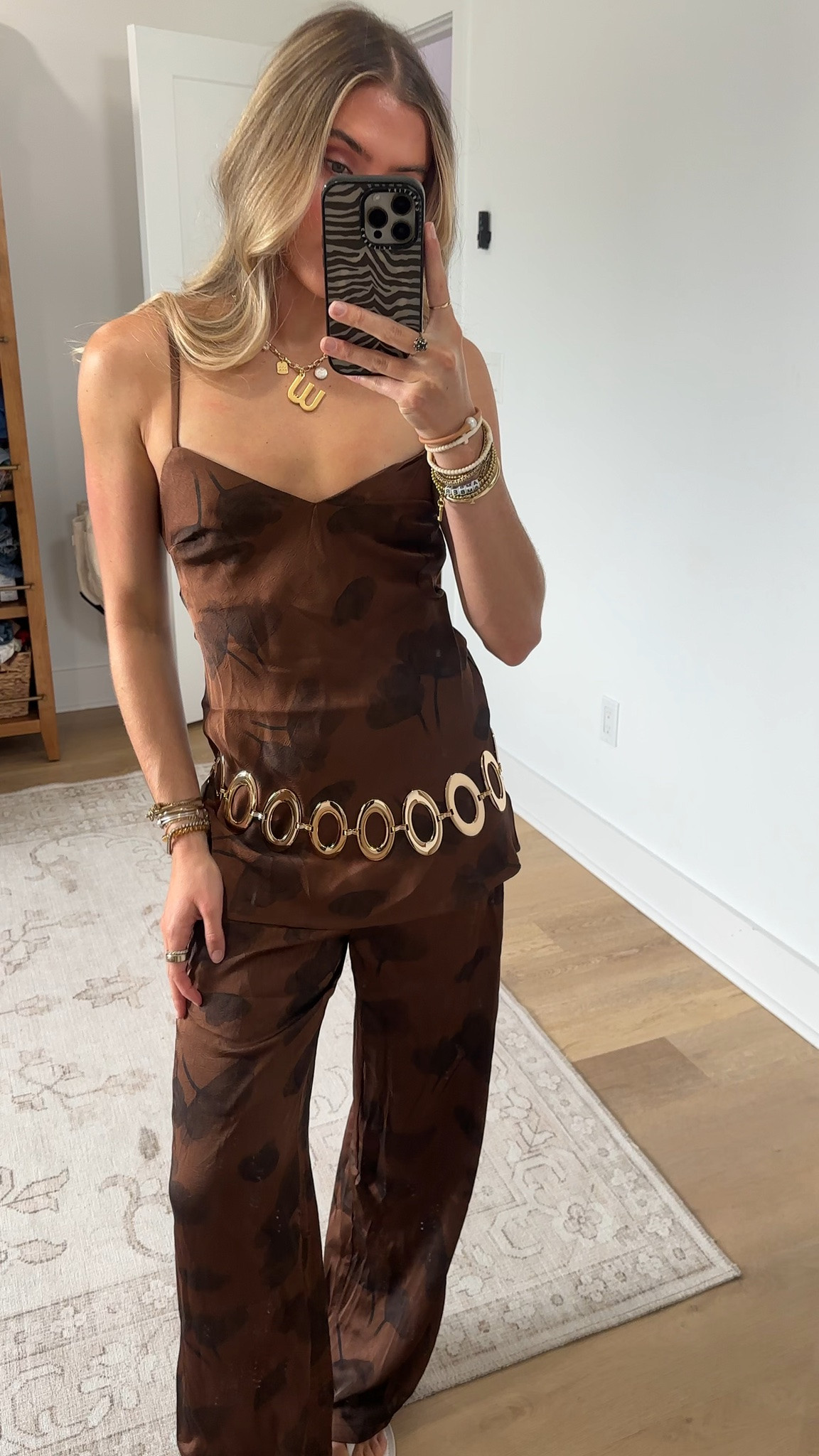 @12th Tribe code is SLOANEFES10. Nothing says golden hour like the Valentina Gold Chain Belt. This bold belt with statement ovals is the boho finishing touch to flowing skirts and dresses. For nights that deserve a little sparkle, the Valentina Gold Chain Belt is your summer wardrobe’s secret weapon.

#LTKootd #LTKSeasonal #LTKSaleAlert