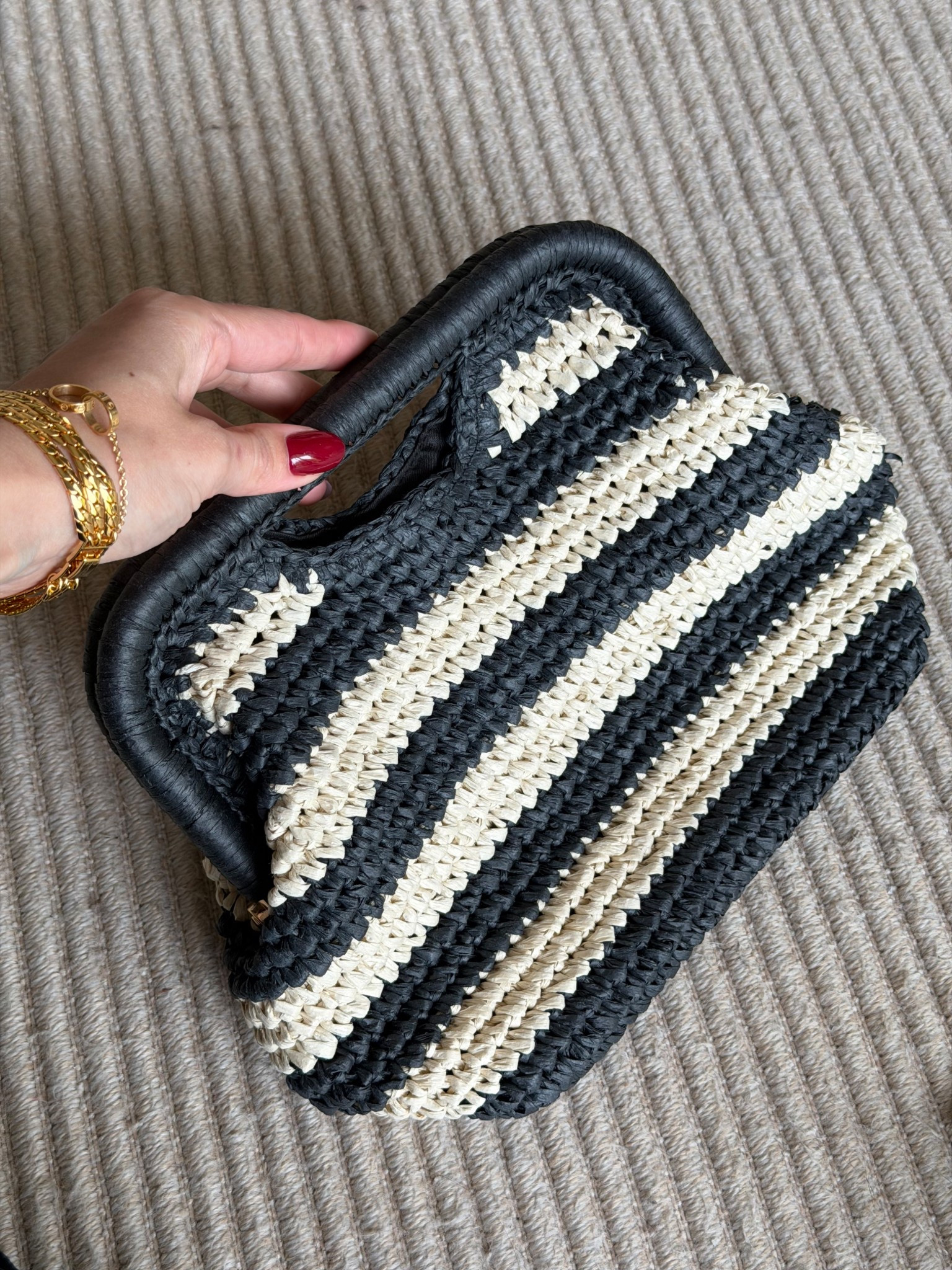 This clutch is such a good summer find 🤍 I just got it and I love how it instantly pulls a look together without trying too hard.

The raffia in natural + black makes it feel a little more elevated than your typical beach bag, so you can wear it with pretty much anything. Linen sets, dresses, even a super simple outfit and it still looks styled.

It’s lightweight, easy to carry, and perfect for summer, vacations, dinners…

If you’ve been looking for a raffia bag / summer clutch that goes with everything, this one is really good, and it’s under $100!

#LTKSeasonal #LTKTravel #LTKSwim
