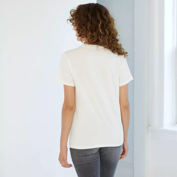 Women's AC/DC Lightning Bolt Boyfriend Short Sleeve Graphic T-Shirt - Cream | Target