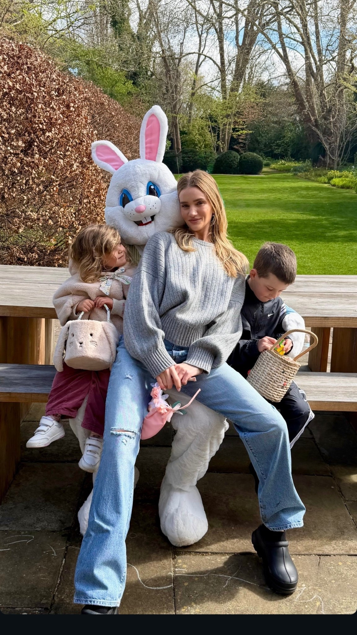  Rosie Huntington-Whiteley's Rigid Boyfriend Jeans and A rib-jersey-stitch pullover in Italian cashmere selected for its sleeker look and lofty character. Accented by more robust ribbing at crewneck, cuffs, and hem. Tasman x Round Toe Ankle Boots