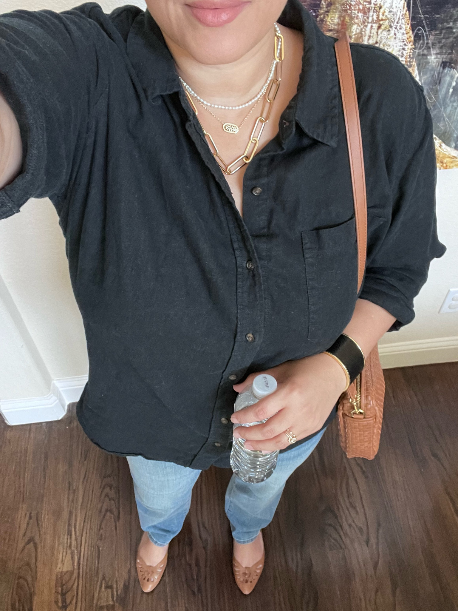 Casual fall outfit for lunch at Biscuit Bar. 

Black linen shirt, straight leg jeans, woven leather crossbody, tan woven leather flats.

#LTKSeasonal #LTKMidsize #LTKOver40