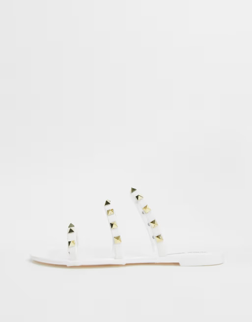 Public Desire Cosmic studded flat jelly sandals in white | ASOS (Global)