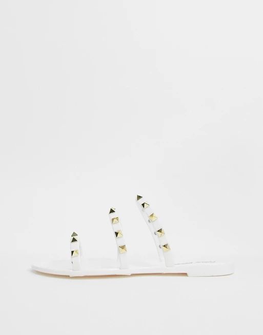 Public Desire Cosmic studded flat jelly sandals in white | ASOS (Global)