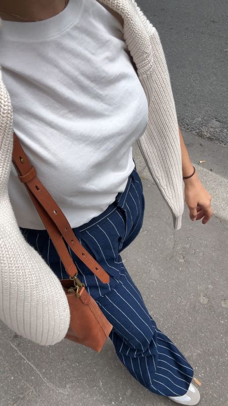 Paris travel outfit

Striped trousers from gap
White T-shirt 
Sweater 
Adidas Samba sneakers 

#LTKShoeCrush #LTKSeasonal #LTKVideo