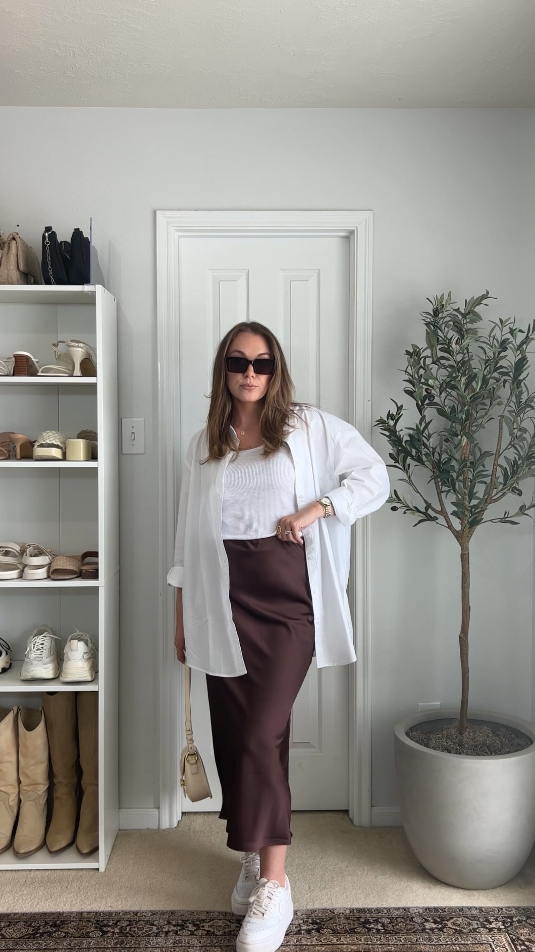 DAY ONE | summer to fall transitional outfits 🍂 comment SKIRT to have the link to this outfit sent to your inbox or shop the look on my @shop.ltk 🫶🏼

Shirt XL
Tank M 
Skirt S 
.⁠
.⁠
.⁠
.⁠
trendy fashion, trendy outfit, Pinterest outfit, casual chic style, casual wear, Pinterest style, Pinterest girl, minimalist style, casual outfit, outfit ideas, fall trends, fall outfit, fall style, fall fashion, fall transition. #falloutfitinspo #falltransition #falltrends #fallstyle 

#LTKunder100 #LTKstyletip #LTKSeasonal