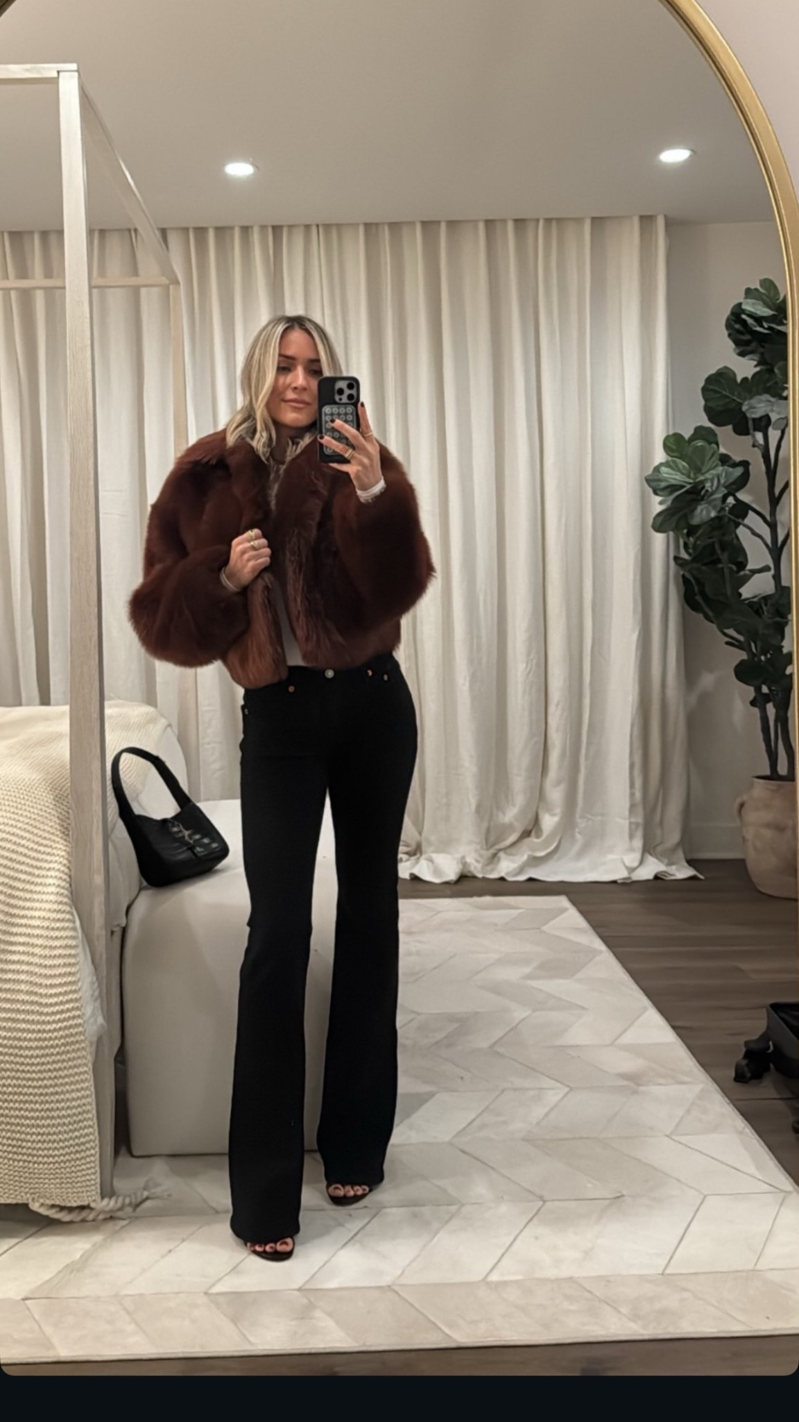 Kristin Cavallari wearing a shearling cropped jacket High Waist Relaxed Bootcut Jeans