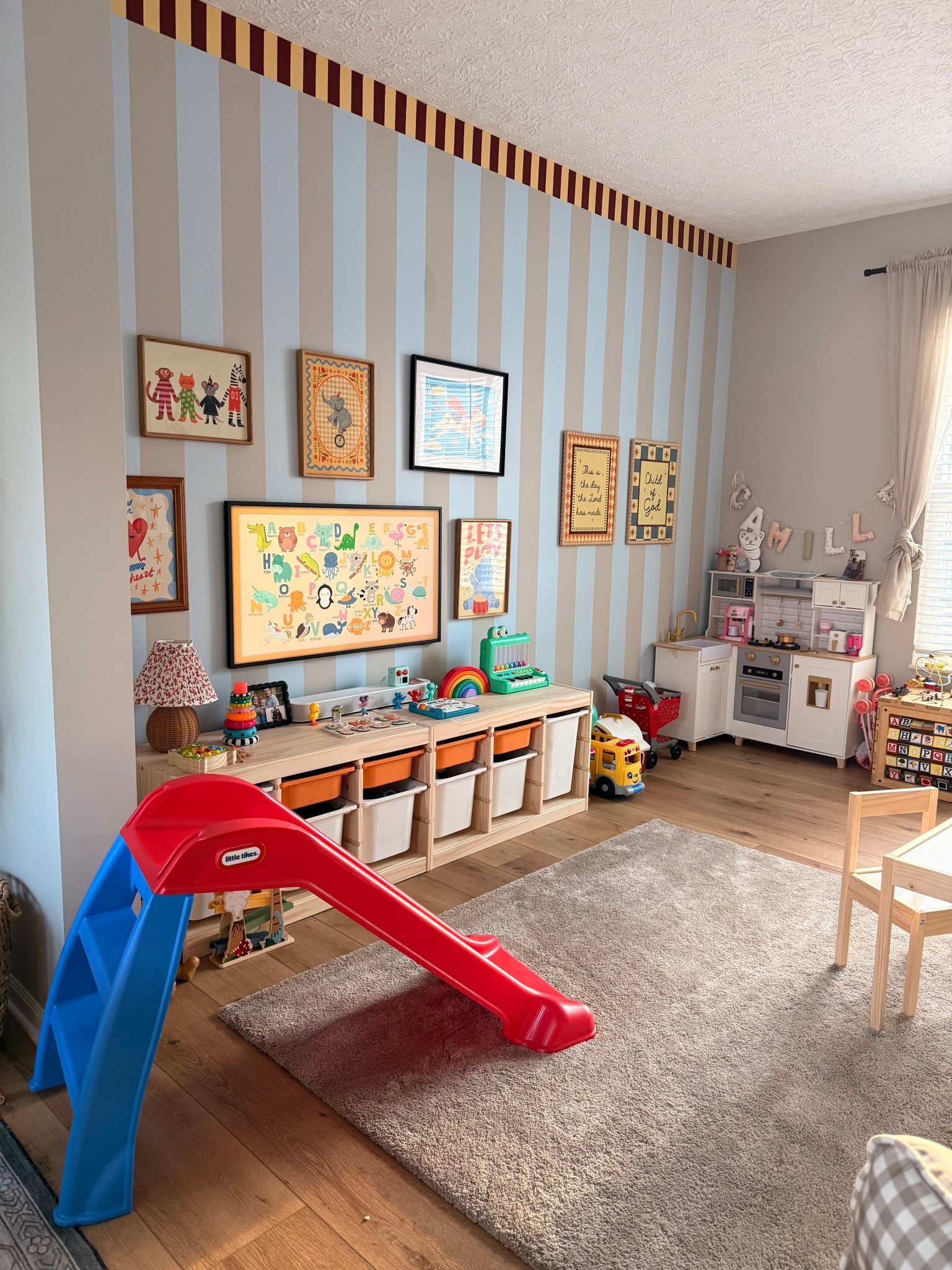 our toddler playroom that gets used DAILY 🤍
linked similar storage options + playroom finds/ wall decor that we LOVE. this organization has worked great for our toddler! 
#playroomideas #toystorage #momlife #kidsdecor #functionalhome #playkitchen #slide #ikea

#LTKKids #LTKHome #LTKdayinmylife