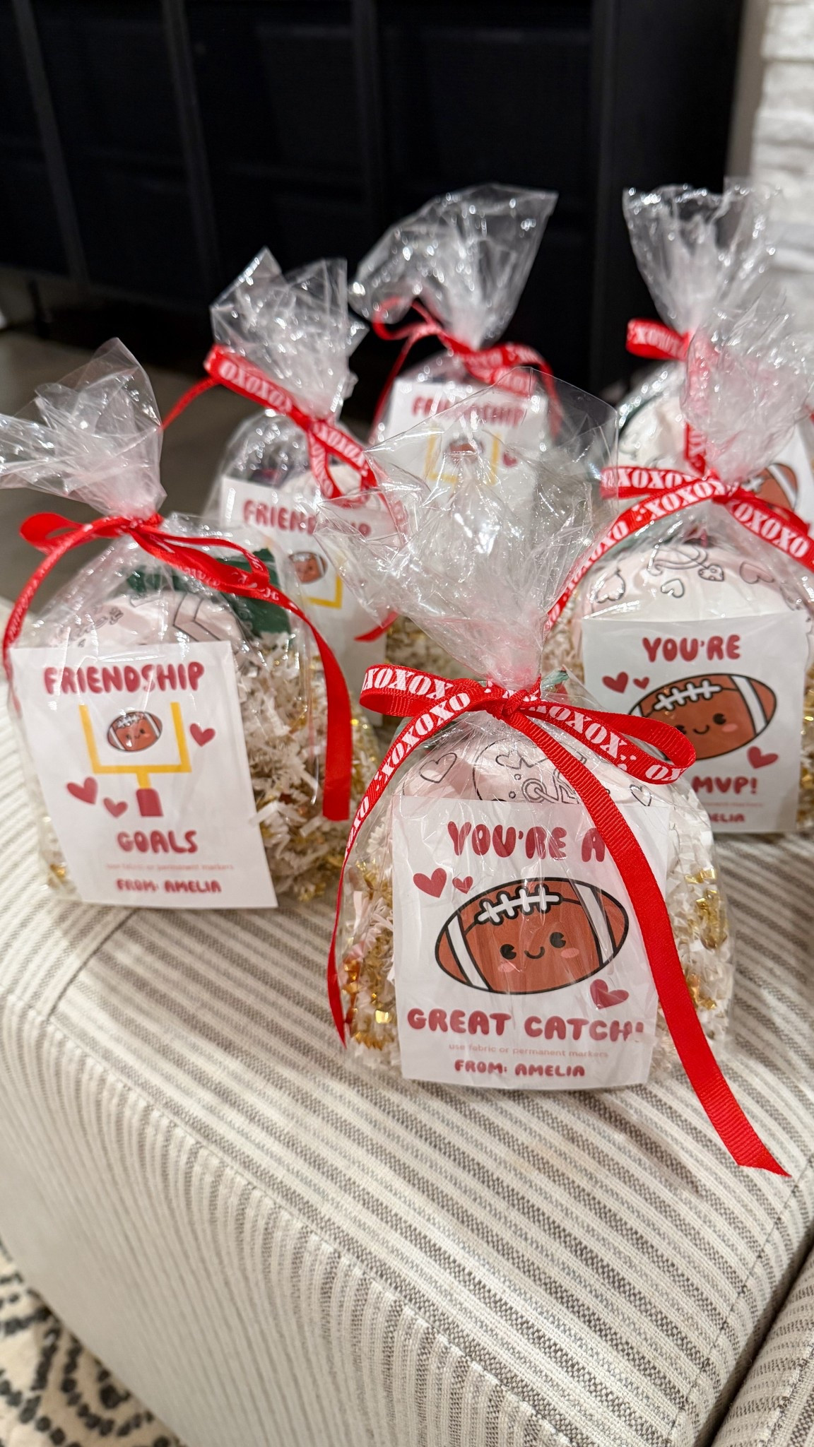 Class Valentine's gifts with mini footballs and healthy fruit bars in cello bags tied with vday ribbon! DIY'd the football themed cards using my Circut! 

#LTKKids #LTKValentine #LTKHome