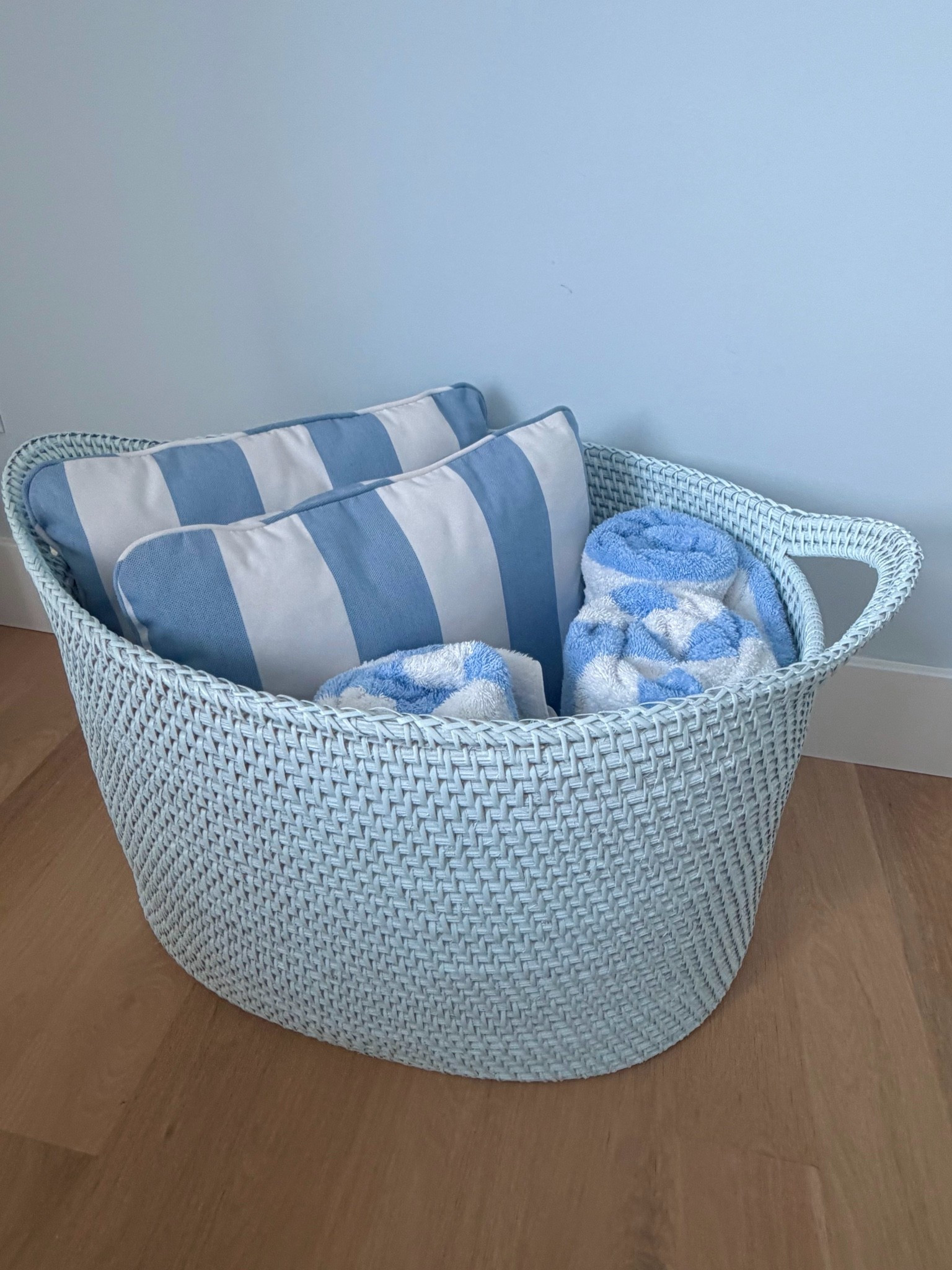 Gorgeous pale blue basket with pillows and towels for outdoor loungers.

#LTKSeasonal #LTKHome #LTKSaleAlert