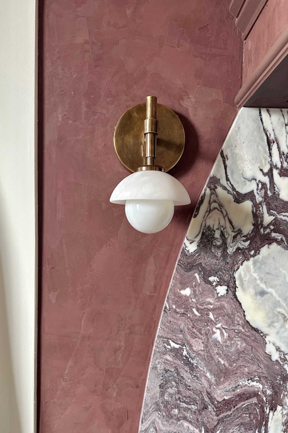 My beautiful kitchen sconces with alabaster shades and unlacquered brass 🫶🏼

#LTKHome