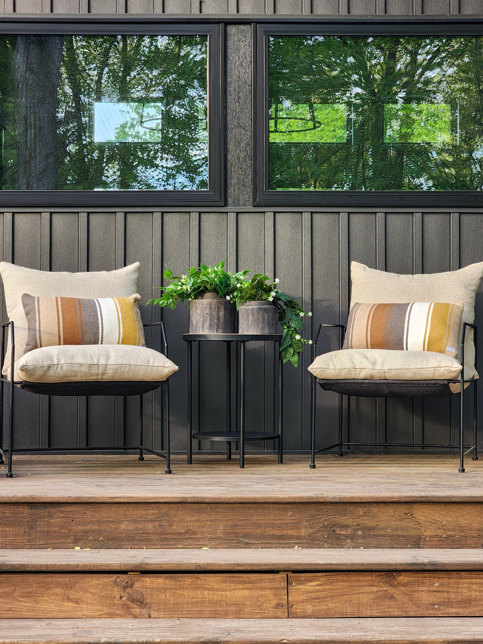 For this year's spring - summer front porch look, I used most of the same decor from last season with a sprinkle of new additions. 

Old || Striped lumbar pillows • Black round transitional accent table 

New || Contemporary metal chairs with tan cushions • Tabletop viral planters from Walmart filled with new and old artificial greenery + flowers 

#LTKHome #LTKSeasonal