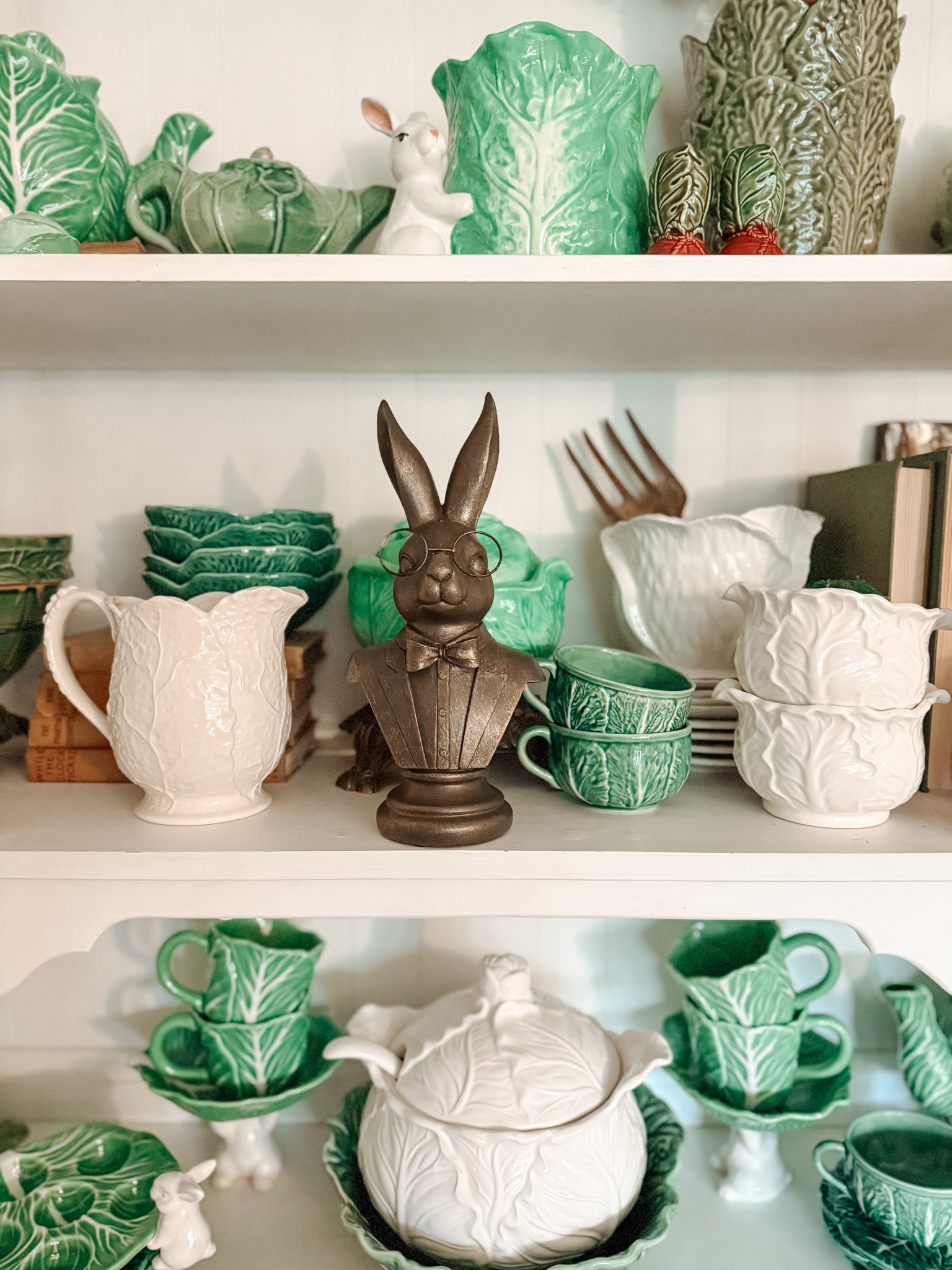 When a decor piece has this much personality… you build the whole shelf around it 🐰✨

Our bespectacled rabbit instantly became the statement of this vintage cottage hutch—layered with classic cabbageware, soft neutrals, and rich greens for that collected, heirloom feel.

He’s equal parts charming, a little quirky, and completely unforgettable (aka exactly what your decor should be).

Linked in our storefront along with similar cottage-inspired finds 🤍

#ltkhome #vintagecottage #cottagecoredecor #collectedhome #springdecor