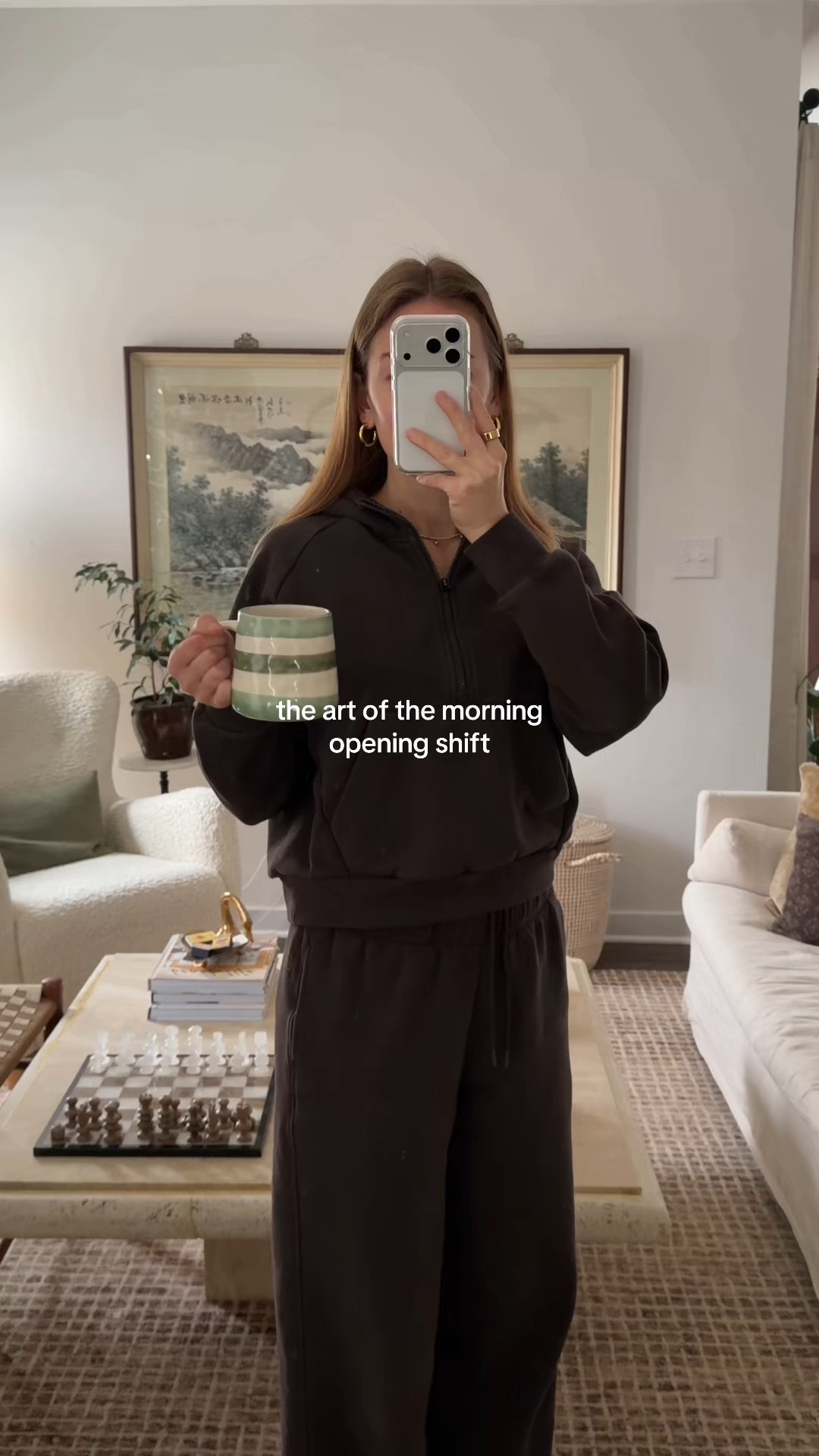 1/2/26 Morning opening shift essentials — wearing my Athleta brown set for a cozy start, wrapped up with my Lola blanket, iPad close by, coffee made with my pour-over from Amazon, and our linen curtains and shades.

#LTKSeasonal #LTKHome