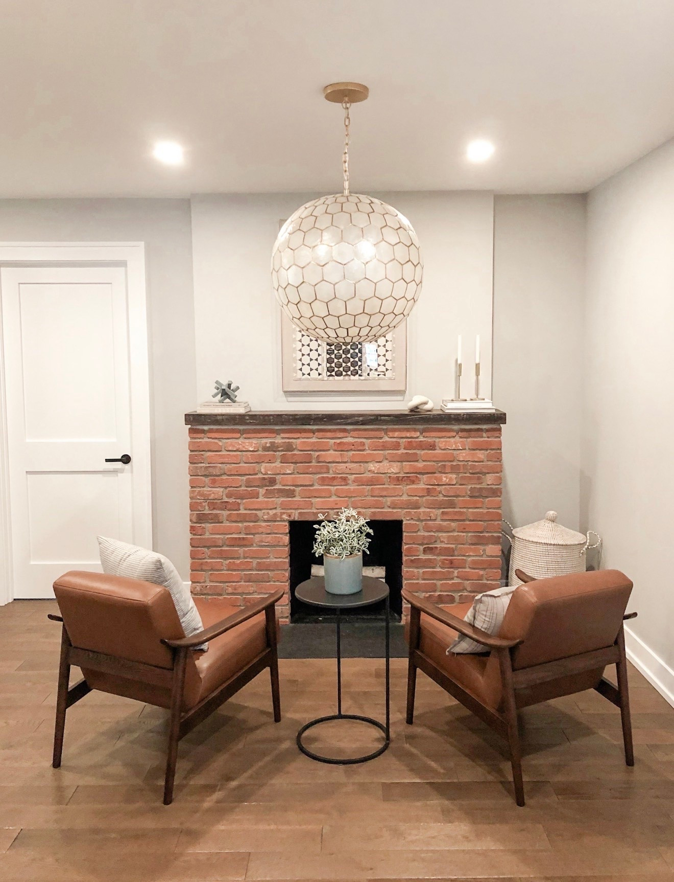This capiz shell pendant is one of those fixtures that instantly transforms a room. The texture, scale, and soft glow make it feel like a piece of art while adding warmth and character to the space. If you’re looking for a place to splurge in your home, statement lighting is always at the top of my list.

statement lighting, capiz shell pendant, pendant lighting, home decor, interior design, lighting inspiration, basement design, fireplace styling, coastal home, neutral interiors, girlonthehudson

#LTKHome #LTKSeasonal