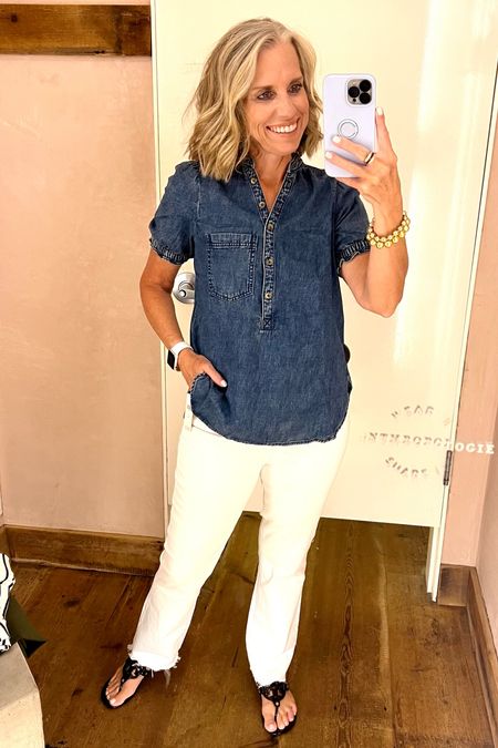 Cutest denim shirt. Looks darling with white, colors or goes perfectly with wide leg cropped denim from Spanx to look like a jumpsuit. Wearing XS 

#LTKSaleAlert #LTKFindsUnder100 #LTKOver40