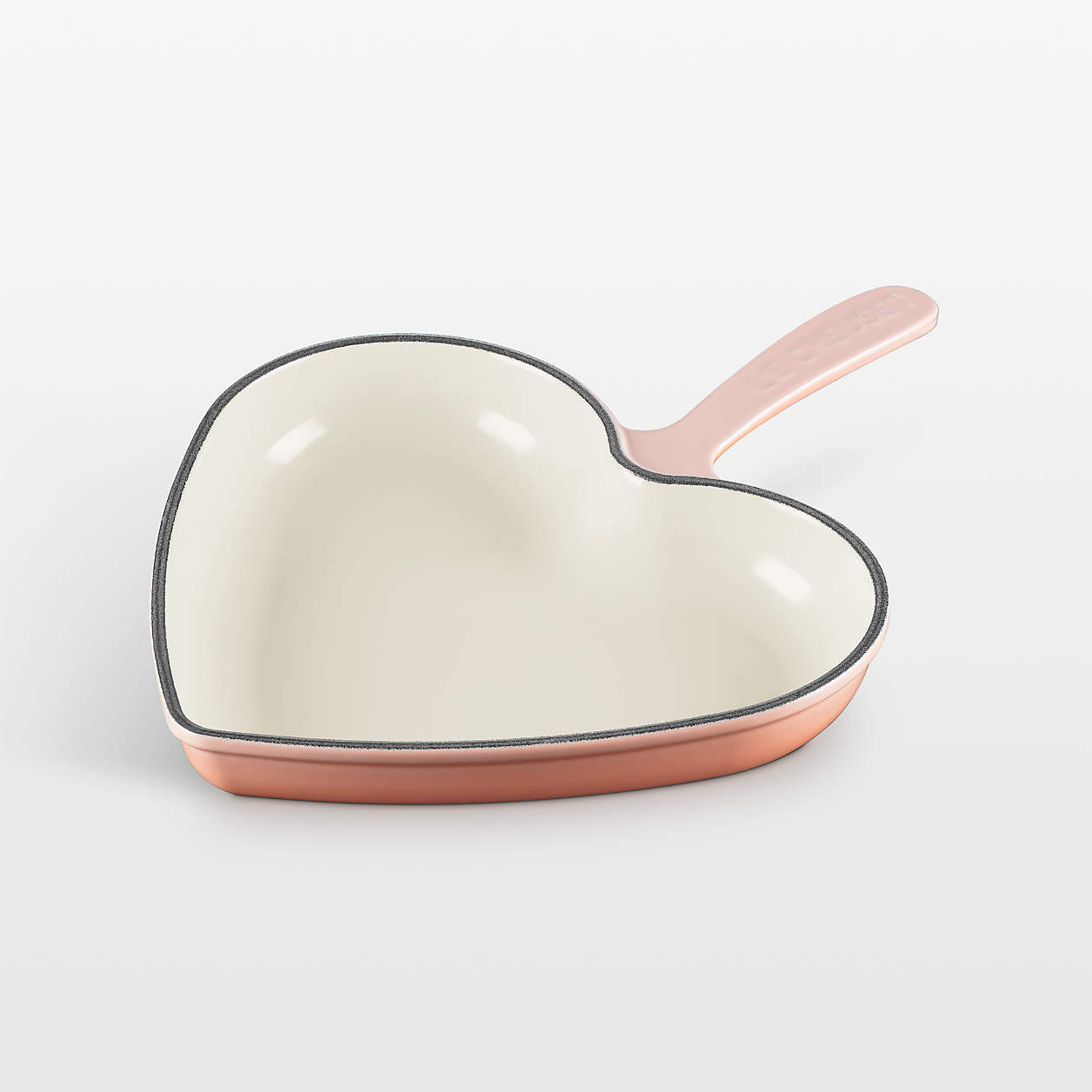 Le Creuset Traditional 10.25" Peche Enameled Cast Iron Heart Skillet | Crate & Barrel | Crate & Barrel