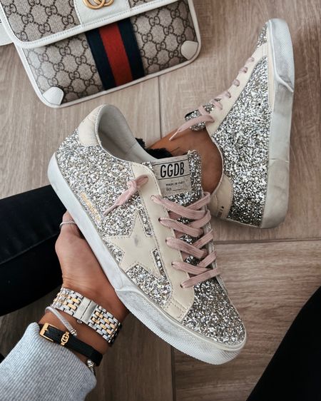 New golden goose …sequin golden goose sneakers , pink laces neutral ggs 
Runs tts ..the ultimate new sneaker for spring 
Gucci jewelry and belt bag 
David yurman cable bracelet and thumb ring 
Michele watch
Luxury gift ideas 
Abercrombie jeans sz 26


#LTKitbag #LTKGiftGuide #LTKshoecrush