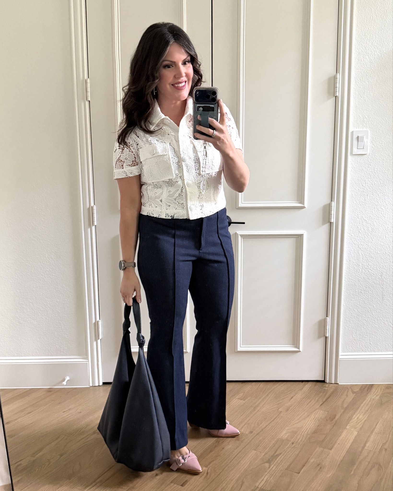 Treated myself to a new work outfit for a very important business dinner! Everyone in the store wanted to try this outfit on once I had it on! This soft white cut work blouse has fancy white metal buttons making it feel very expensive. It runs super small. I’m usually an 8. This is a 12! Couldn’t button the 10. So size up 2!  IM obsessed with these denim/tweed flare slacks. The permanent crease is so sharp. They fit like a glove with a tiny bit of stretch. I started tts in an 8 regular. The length is perfect for me at 5’5” to wear a short heel. I might the matching jacket and sent a pic to my friend in the dressing room and she immediately also ordered! Shoes are my go to favorite for a pop of my personality. Bag is Amazon! I feel like a million bucks! I’m a hoc deep/dark summer and natural ingenue style personality  