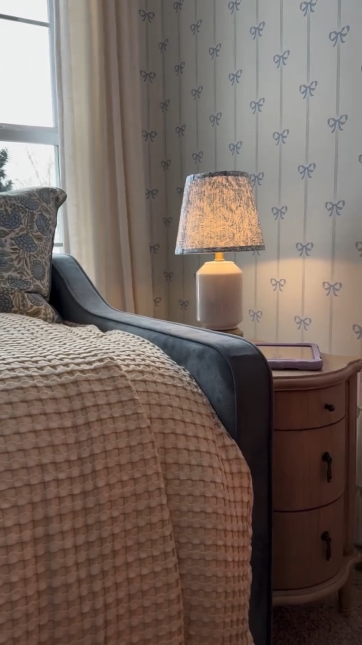 Found the prettiest little nightstand to slide into the narrow space next to Ellie’s daybed 😍 it comes in 3 colors, I’d gorgeous, sturdy and has built in outlets and charging ports 🙌🏻. Comment below and I’ll send you the link!

Nancy Meyers inspired little girls bedroom blue bow bedroom