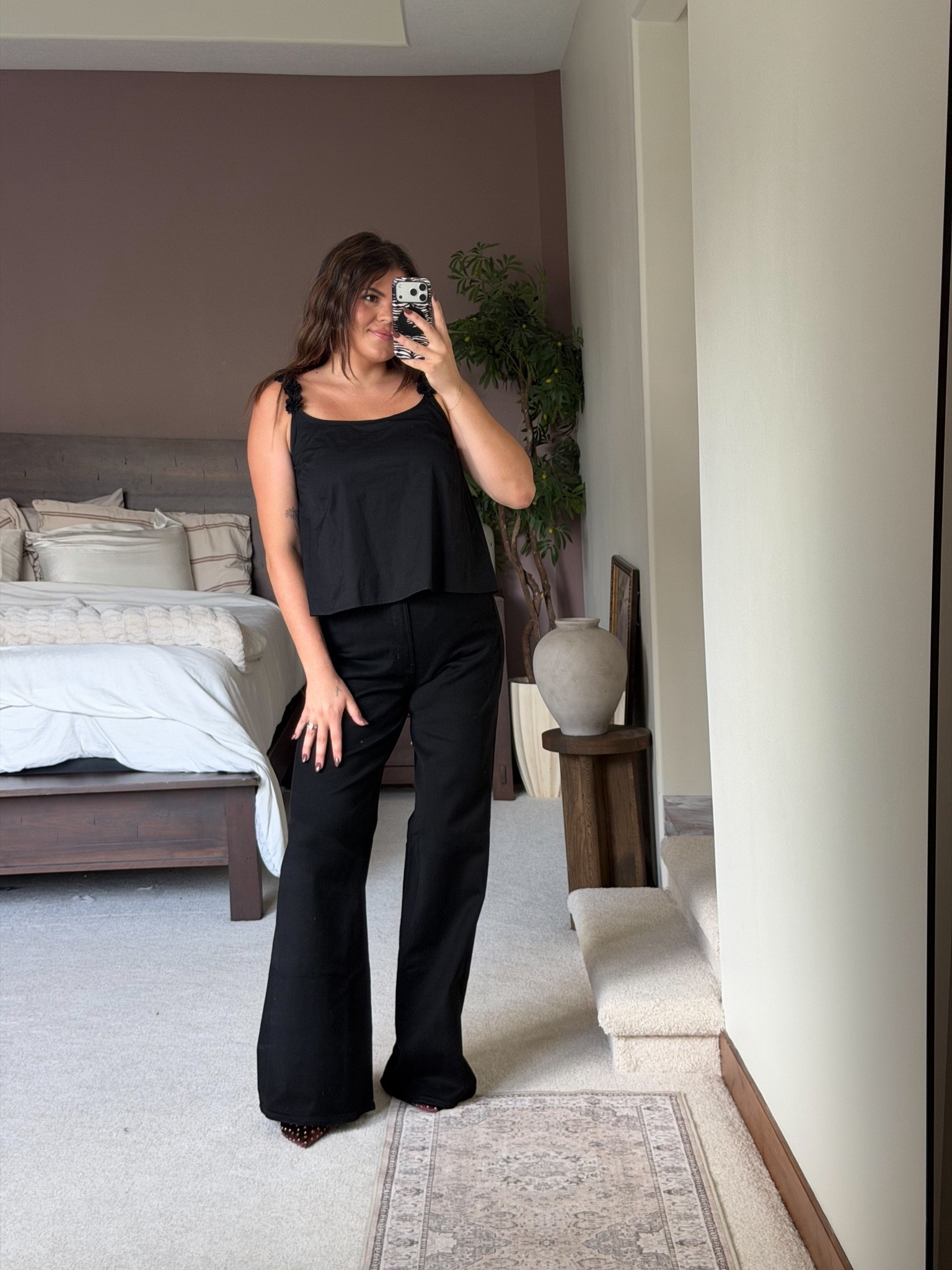 All black fall outfit from old navy

High-rise wide leg jeans size 14 (I ordered tall and regular would be fine) and the tank top with the floral straps size large. Cute for date night or teacher outfit 

Midsize, size 12, size 14, mom style, curvy outfit, thick tummy approved ￼