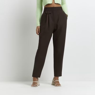 Brown pleated tapered trousers | River Island (UK & IE)