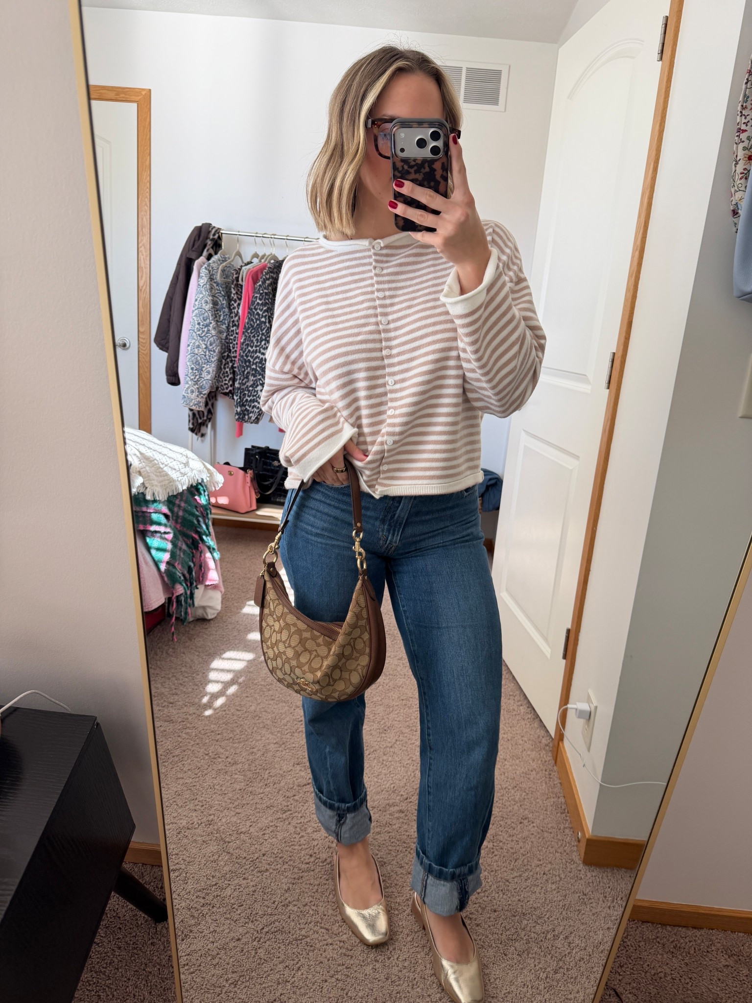 Can never go wrong with a striped cardigan💫💫 Striped Roll-neck Cardigan, Levi’s Jeans, Gold flats, Coach Purse #casualfits #workfits #shortgirlstyle #comfyandcute

#LTKFindsUnder50 #LTKPetite #LTKSeasonal