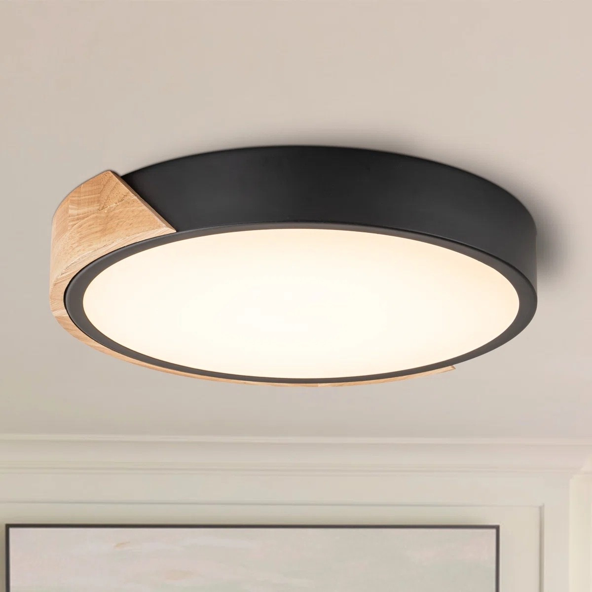 This modern LED flush mount ceiling light from Wayfair is such a sleek upgrade for bedrooms, hallways, kitchens, or entryways. The black finish paired with warm wood detailing gives it that perfect modern organic and Scandinavian inspired look while the low profile design works beautifully in smaller spaces or rooms with lower ceilings. Love that it has integrated LED lighting for a clean and minimal feel. Plus, it’s currently part of the Wayfair Warehouse Clearout event.