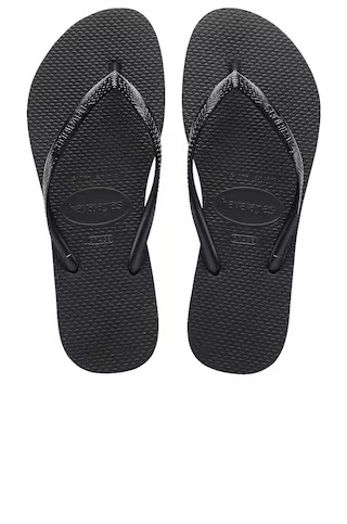 Havaianas Slim Flip Flop in Black from Revolve.com | Revolve Clothing (Global)