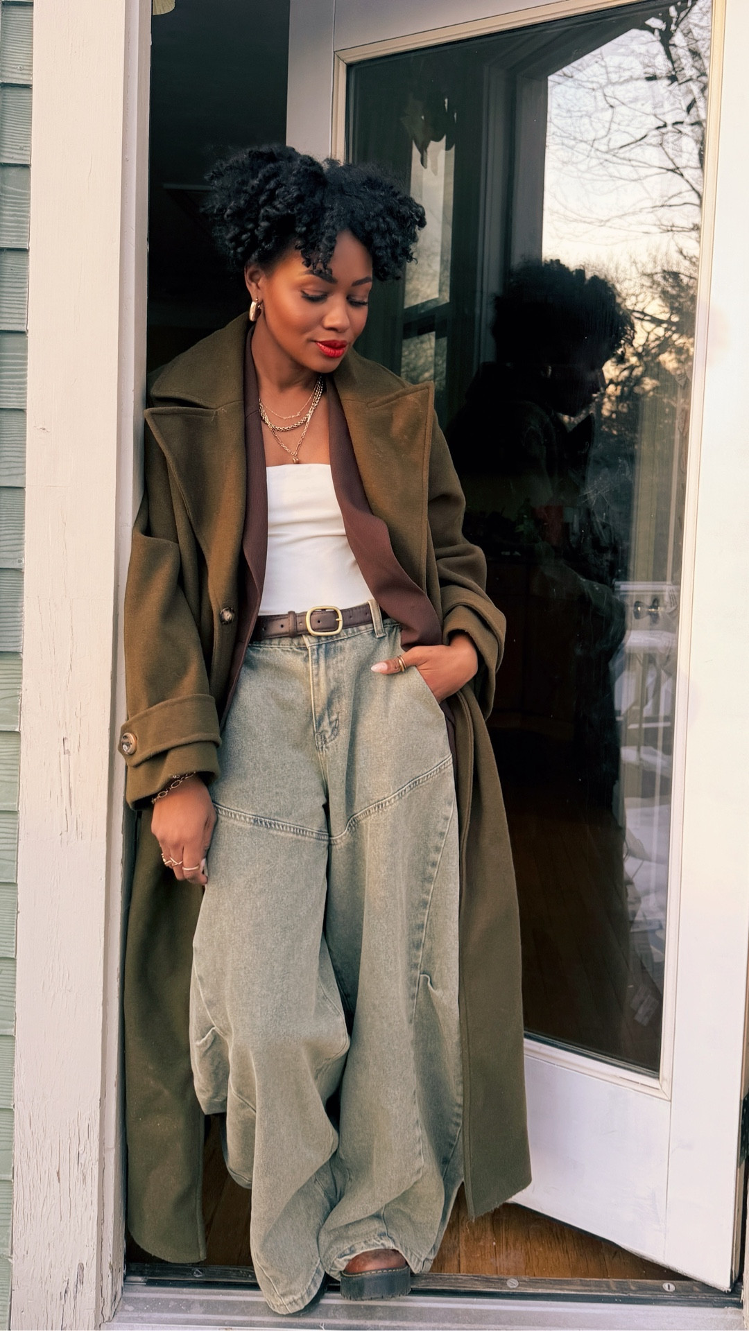 Neutral layers, but make it fashion.

This is what I reach for when I want to feel elevated without trying too hard. An oversized olive coat from @Anthropologie  layered over a structured blazer by @shopdarling via Stitchfix, a clean strapless bodysuit from @freepeople, wide leg vintage wash jeans from @shein, and classic boots from @docmartens



Gold layers to warm it up and a belt to pull it all together.

Relaxed on the bottom, structured on top. Effortless, but intentional.

Everything is linked here on LTK.

#wid​elegjeans #layeredlook #over40style 

#LTKSeasonal #LTKOver40