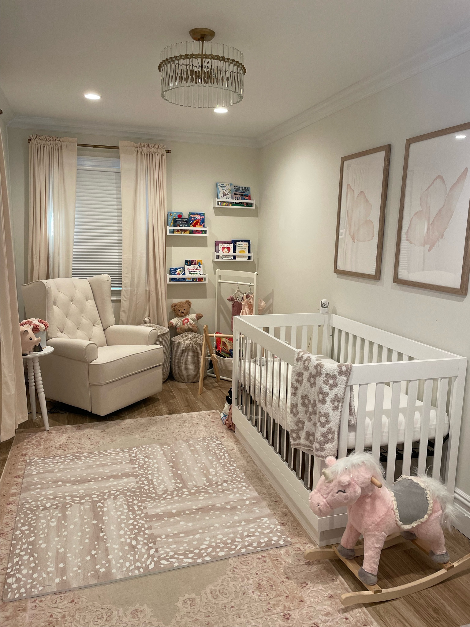 Baby girl nursery details - we used Benjamin Moore Swiss Coffee on the walls 

My favorite part is the butterfly wall art I found on Etsy. I ordered the 20x30 size and framed with poster frames from Amazon. I love the way they came out. The Etsy seller even has a package of 3 butterflies if your wall is larger. 

Baby girl nursery, nursery, nursery decoration, nursery wall art  

#LTKhome #LTKkids #LTKbaby