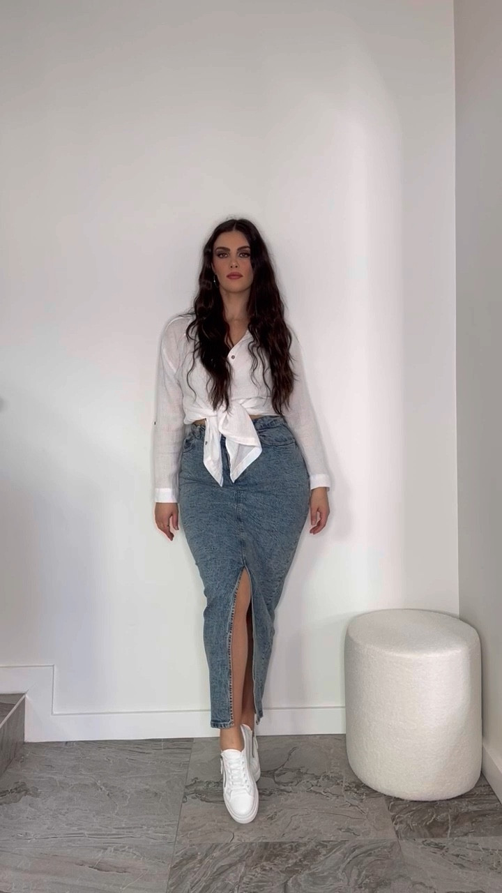Best long denim skirt on the market atm! Wearing size 12 AU, medium stretch and am 5’8. Long sleeve cheese cloth white button up shirt and super comfy white sneakers 🤍

#LTKcurves #LTKaustralia #LTKstyletip