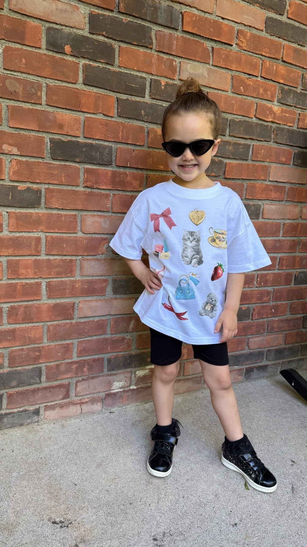 Her top is under $6! Summer look. School looks. Camp looks. Black sneakers. Girls tees. Summer tee. Oversized tees. Walmart girls. Girls tees from Walmart

#LTKdayinmylife #LTKSaleAlert
