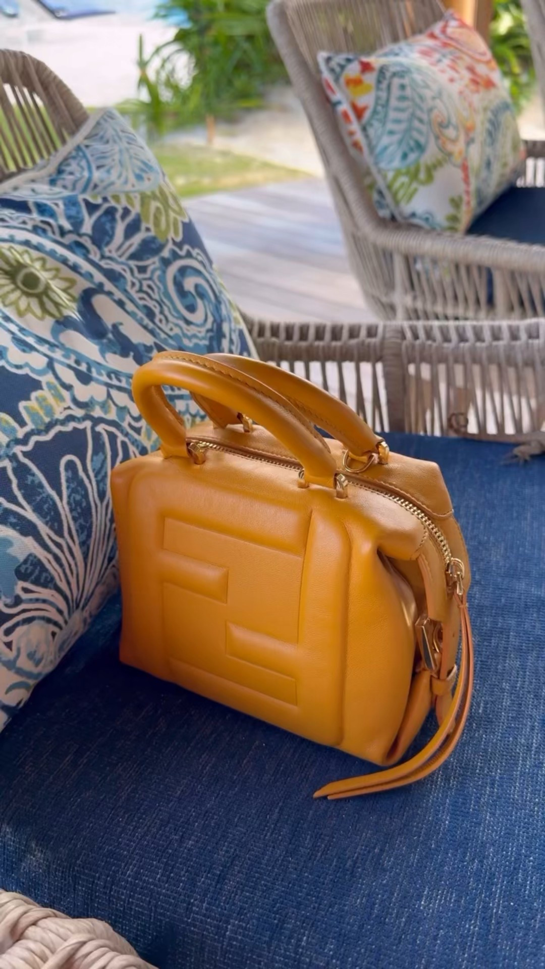 Love this fendi bag for a tropical setting 💛

#LTKootd #LTKU #LTKTravel